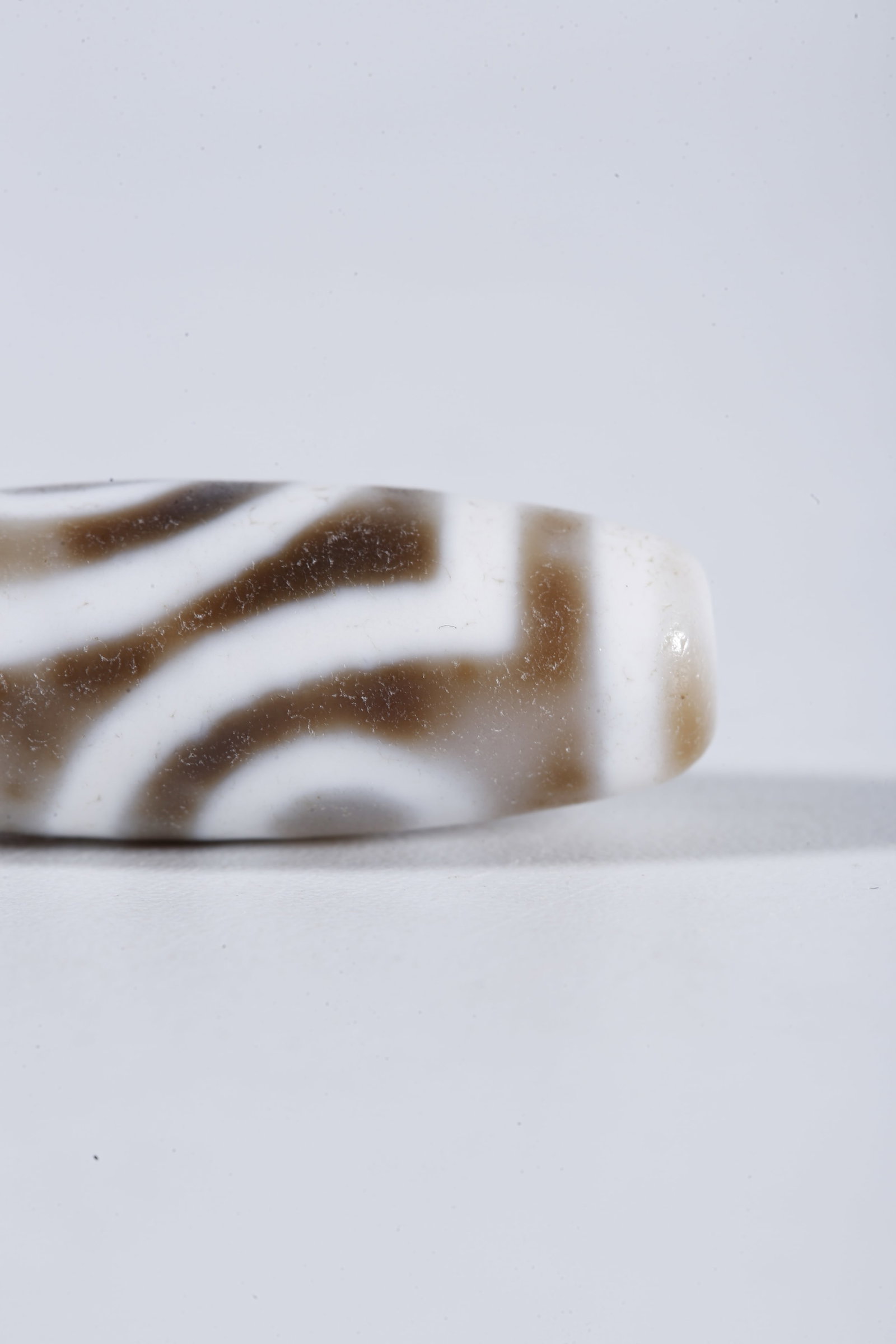 A TWO-EYE DZI BEAD - 7