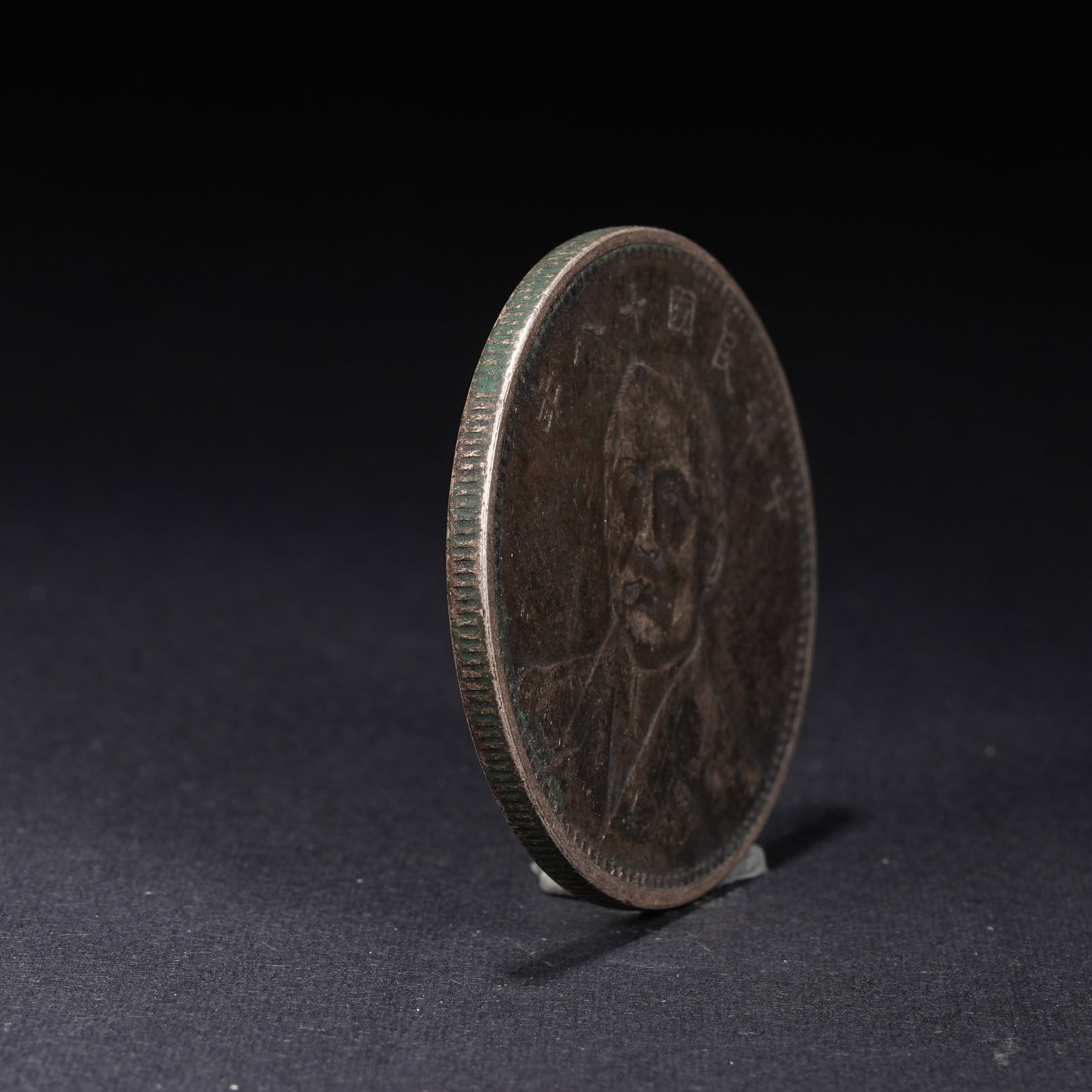 A SILVER DOLLAR COIN - 2