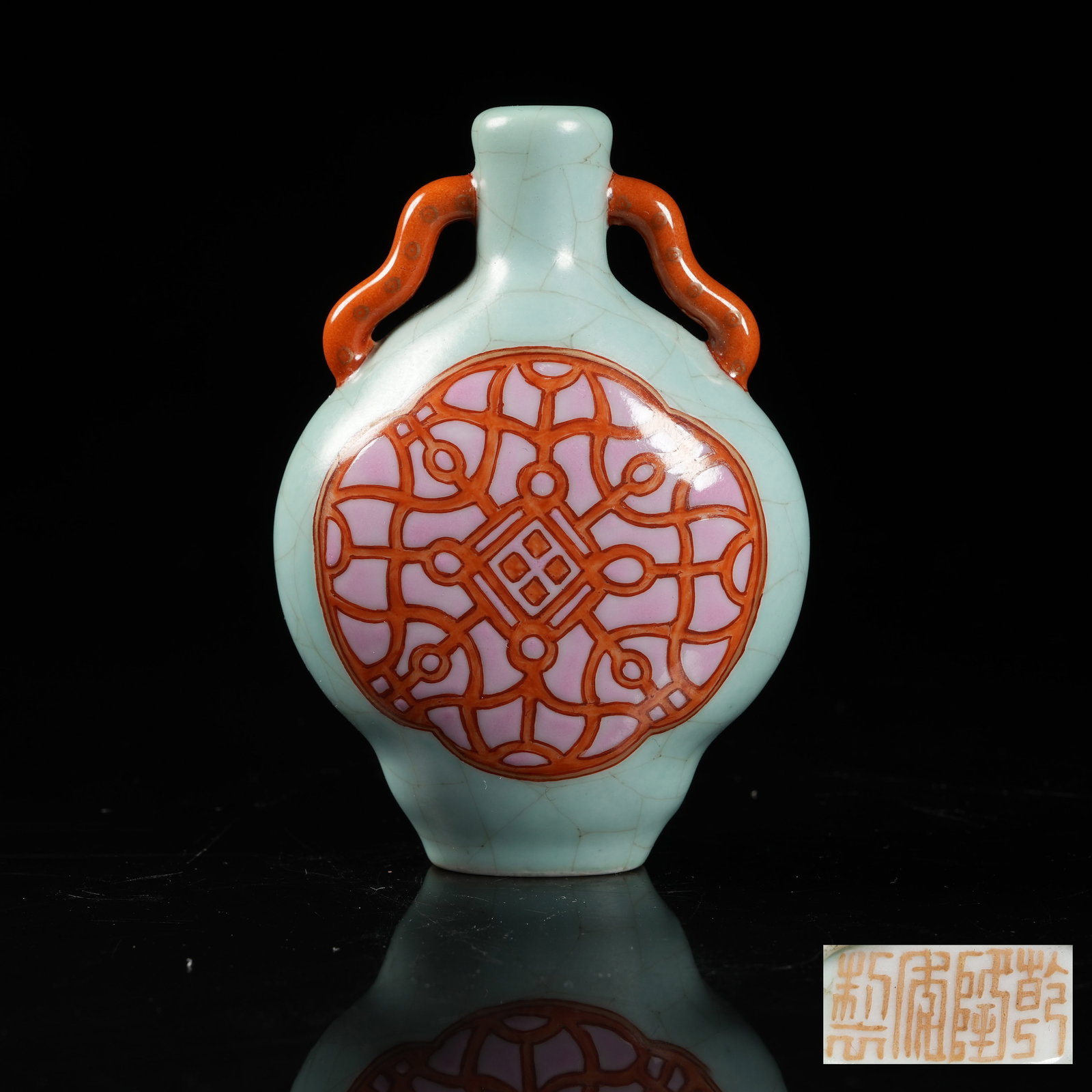 A IMITATION GUAN WARE ROUGE-GROUND SNUFF BOTTLE: Imitation Guan ware rouge-ground snuff bottle
