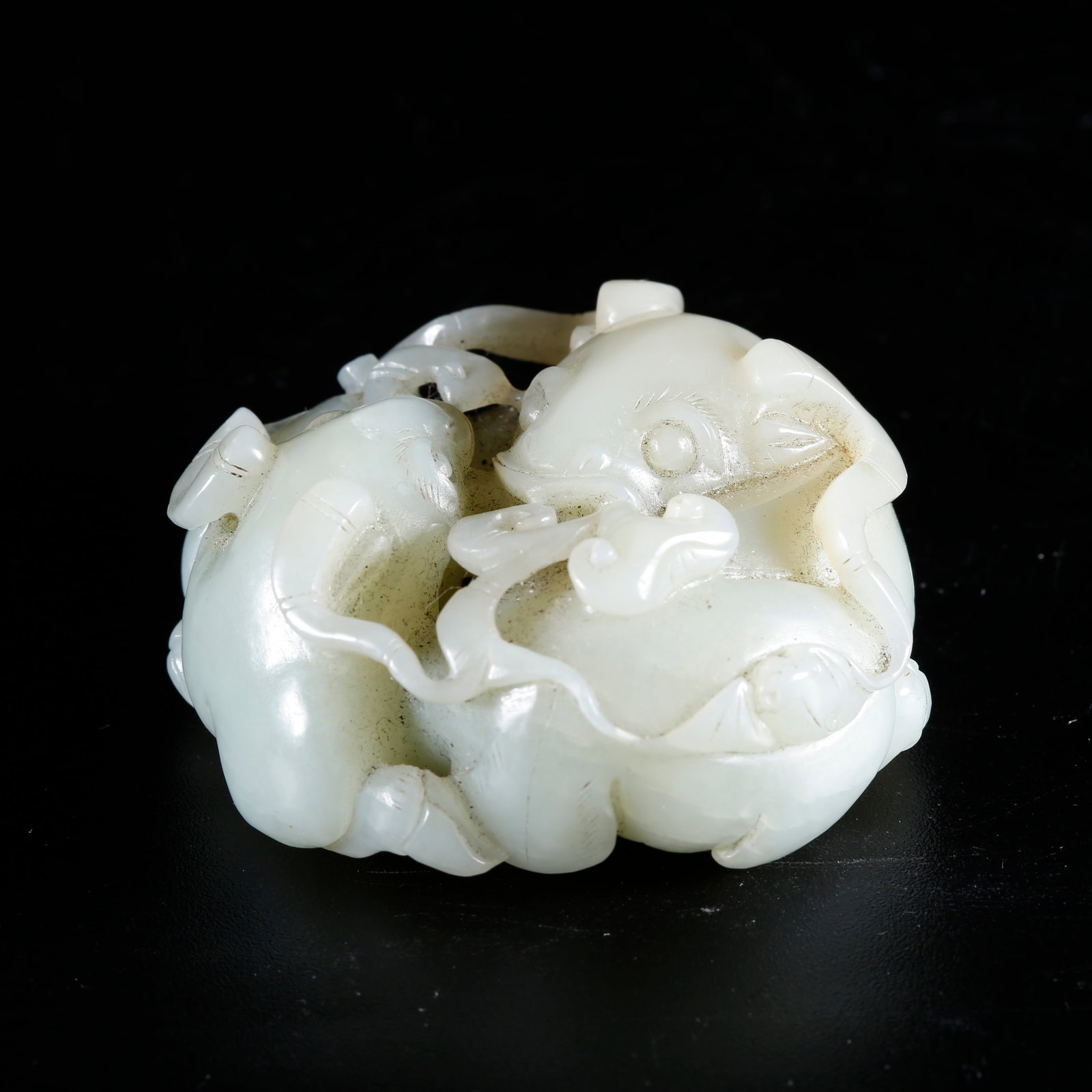A HETIAN JADE CARVED SHEEP FIGURINE (1 of 9)