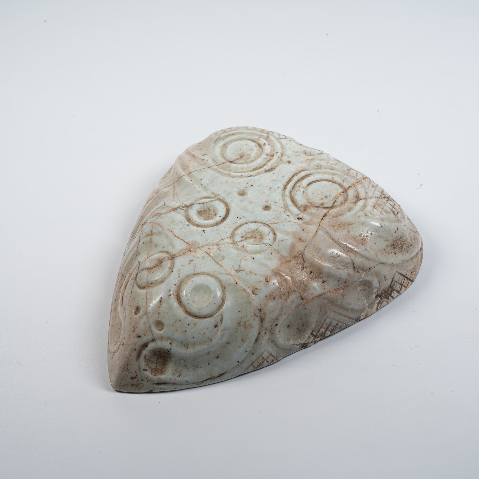 A HONGSHAN CULTURE ARCHAIC JADE ANTHROPOMORPHIC MASK: Hongshan Culture archaic jade anthropomorphic mask