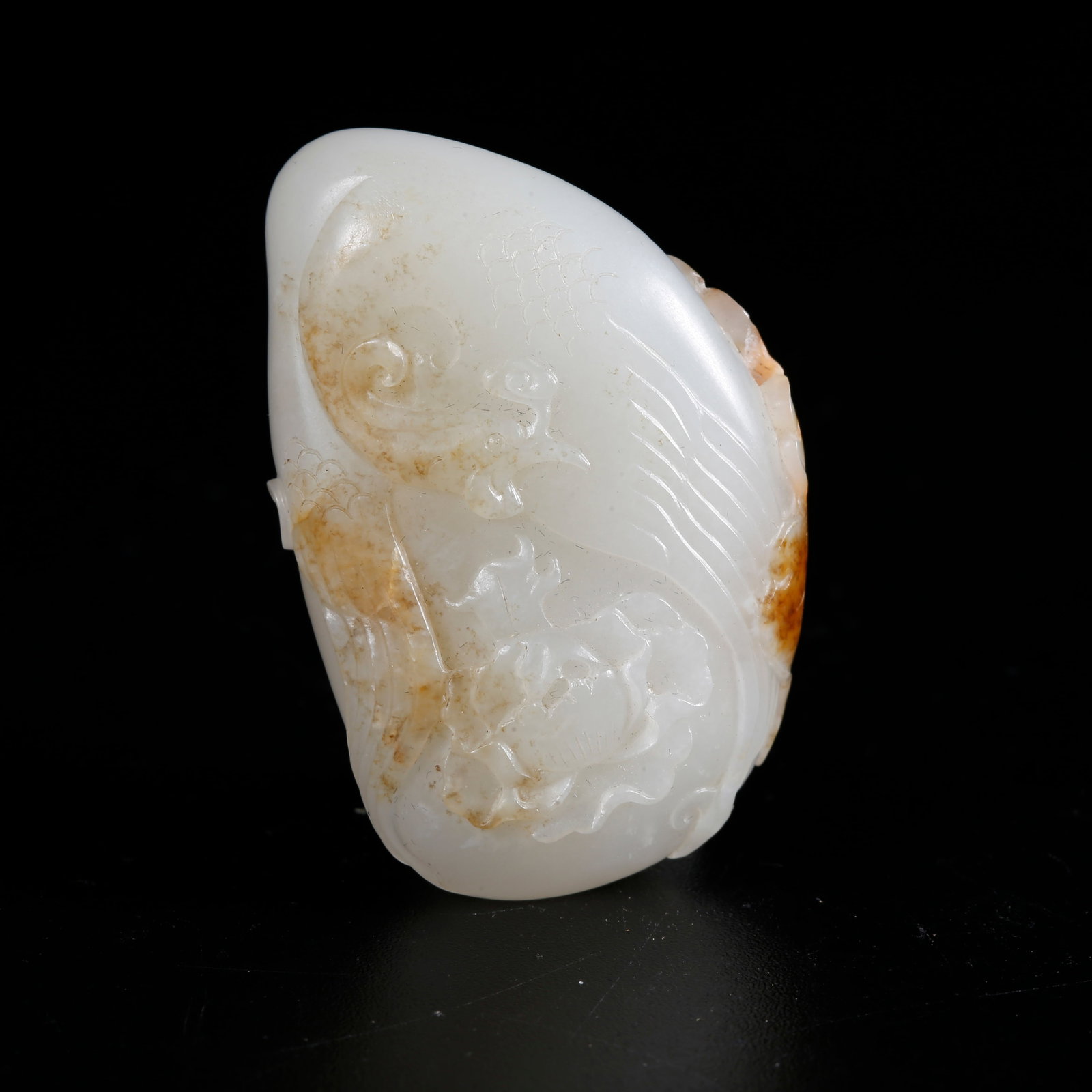 A HETIAN JADE CARVED GOOSE-PATTERN PENDANT: Hetian jade carved goose-pattern pendant