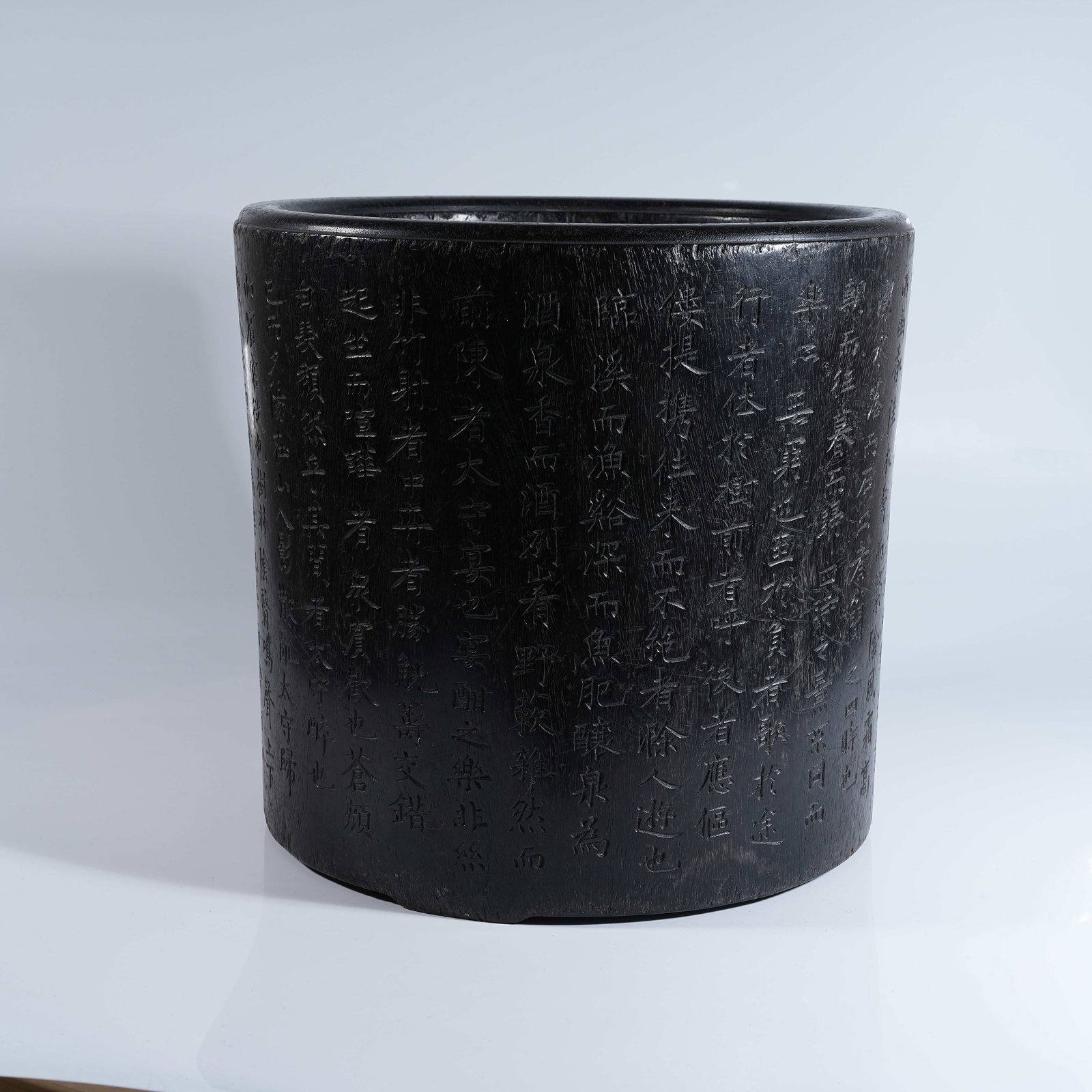 A SMALL-LEAF RED SANDALWOOD LARGE BRUSH POT CARVED WITH POETIC INSCRIPTIONS: Small-leaf Red Sandalwood Large Brush Pot Carved with Poetic Inscriptions