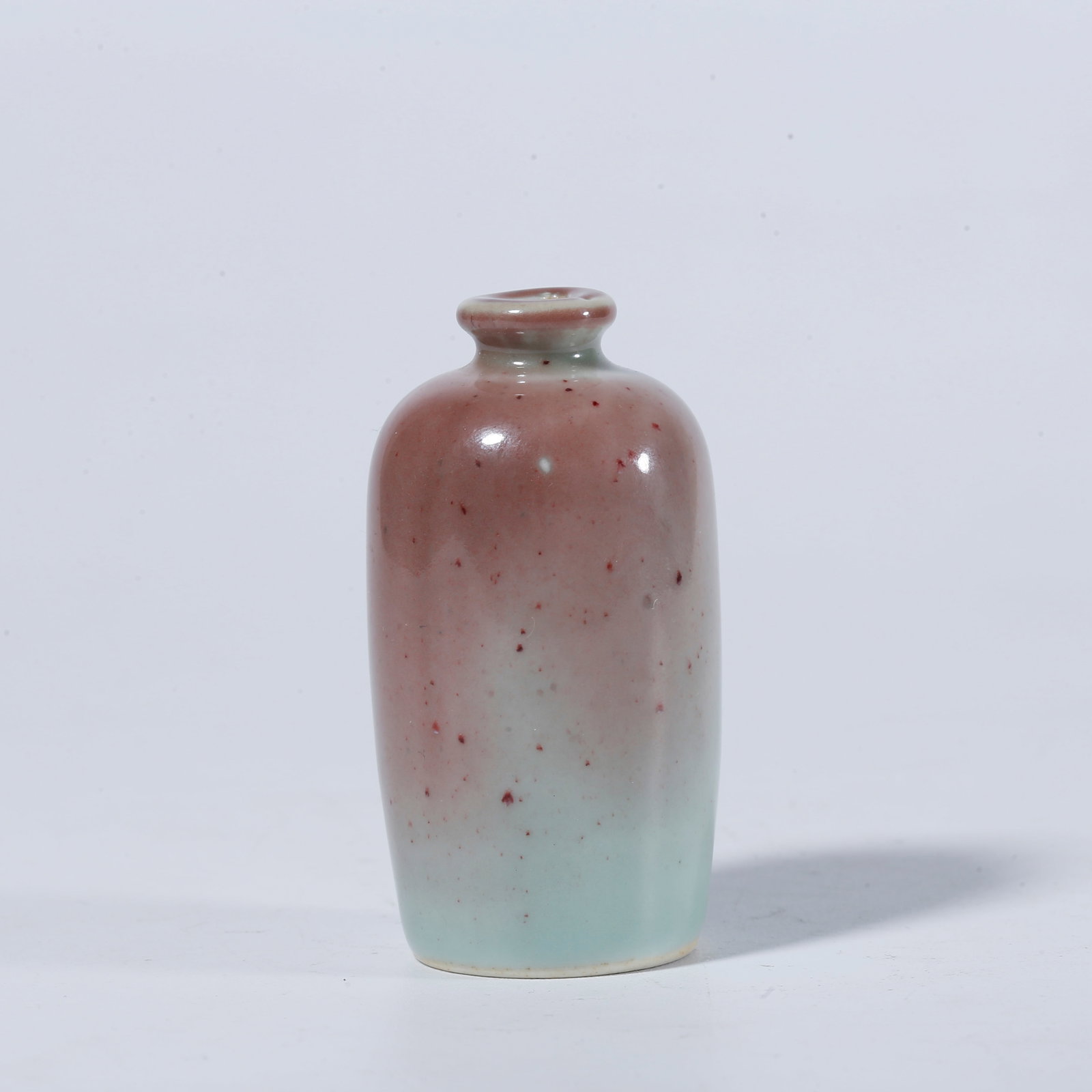 A RED GLAZED SNUFF BOTTLE (1 of 9)