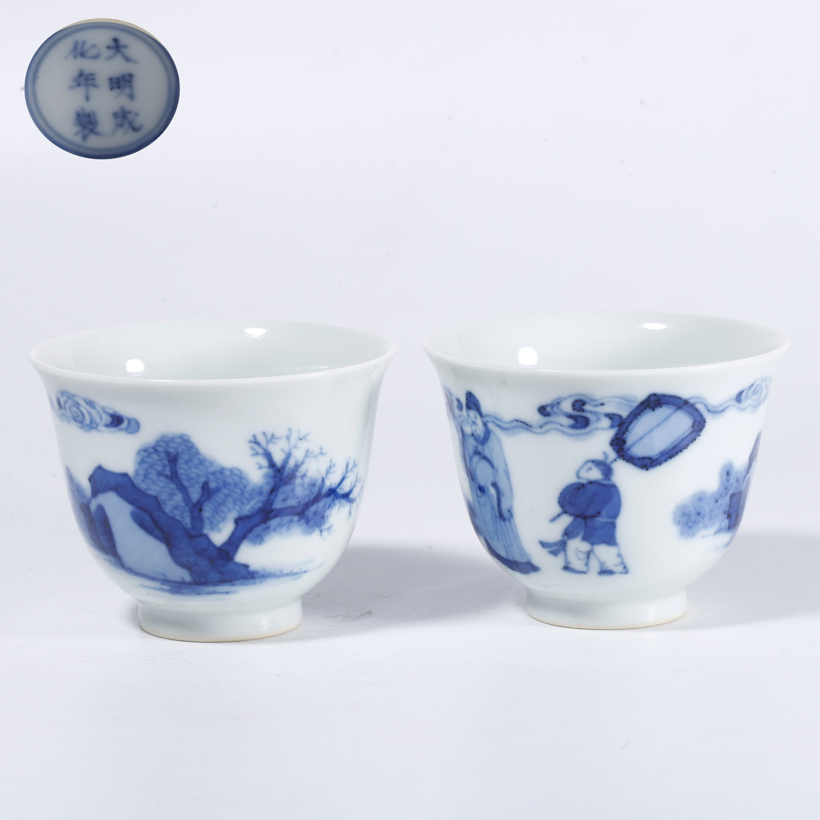 A BLUE-AND-WHITE FIGURAL NARRATIVE CUPS (A PAIR) (1 of 9)