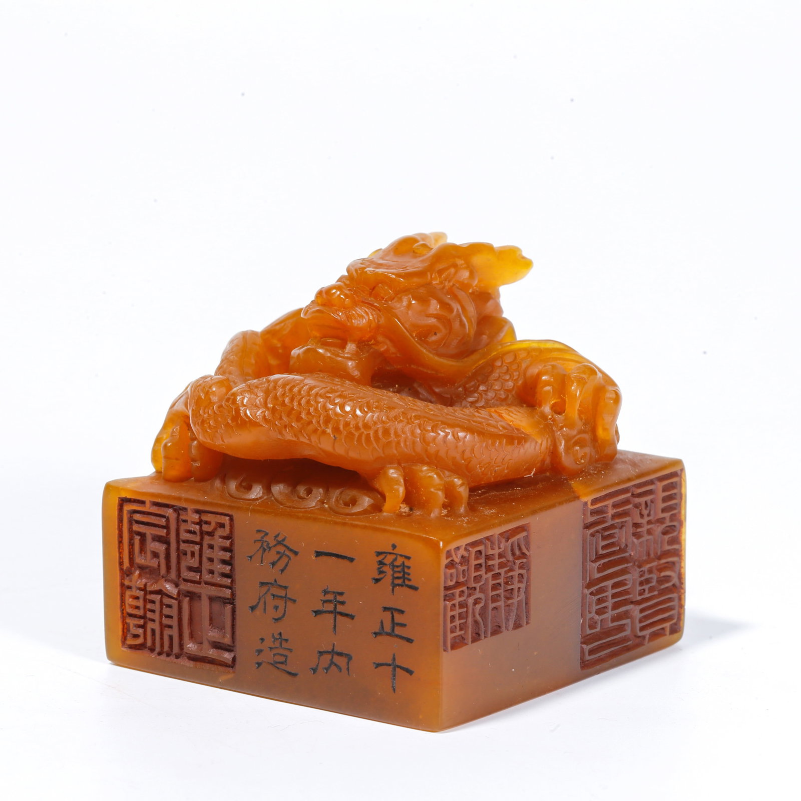 A SHOUSHAN TIANHUANG STONE SEAL WITH CHI DRAGON KNOB: Shoushan Tianhuang Stone Seal with Chi Dragon Knob