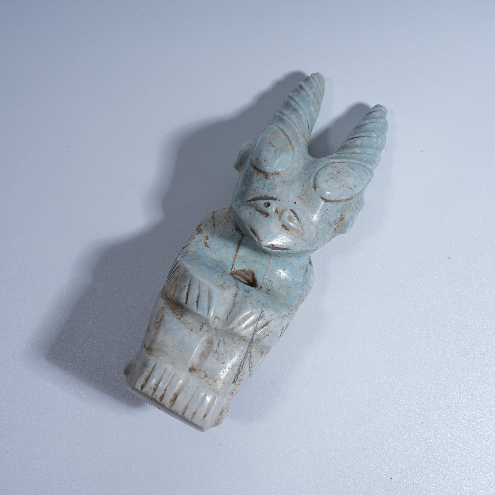 A HONGSHAN CULTURE ARCHAIC JADE SUN DEITY PENDANT: Hongshan Culture archaic jade sun deity pendant