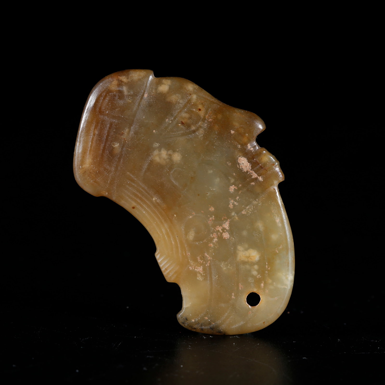 A ANCIENT JADE PENDANT CARVED WITH HUMAN FACE PATTERN: Ancient Jade Pendant Carved with Human Face Pattern