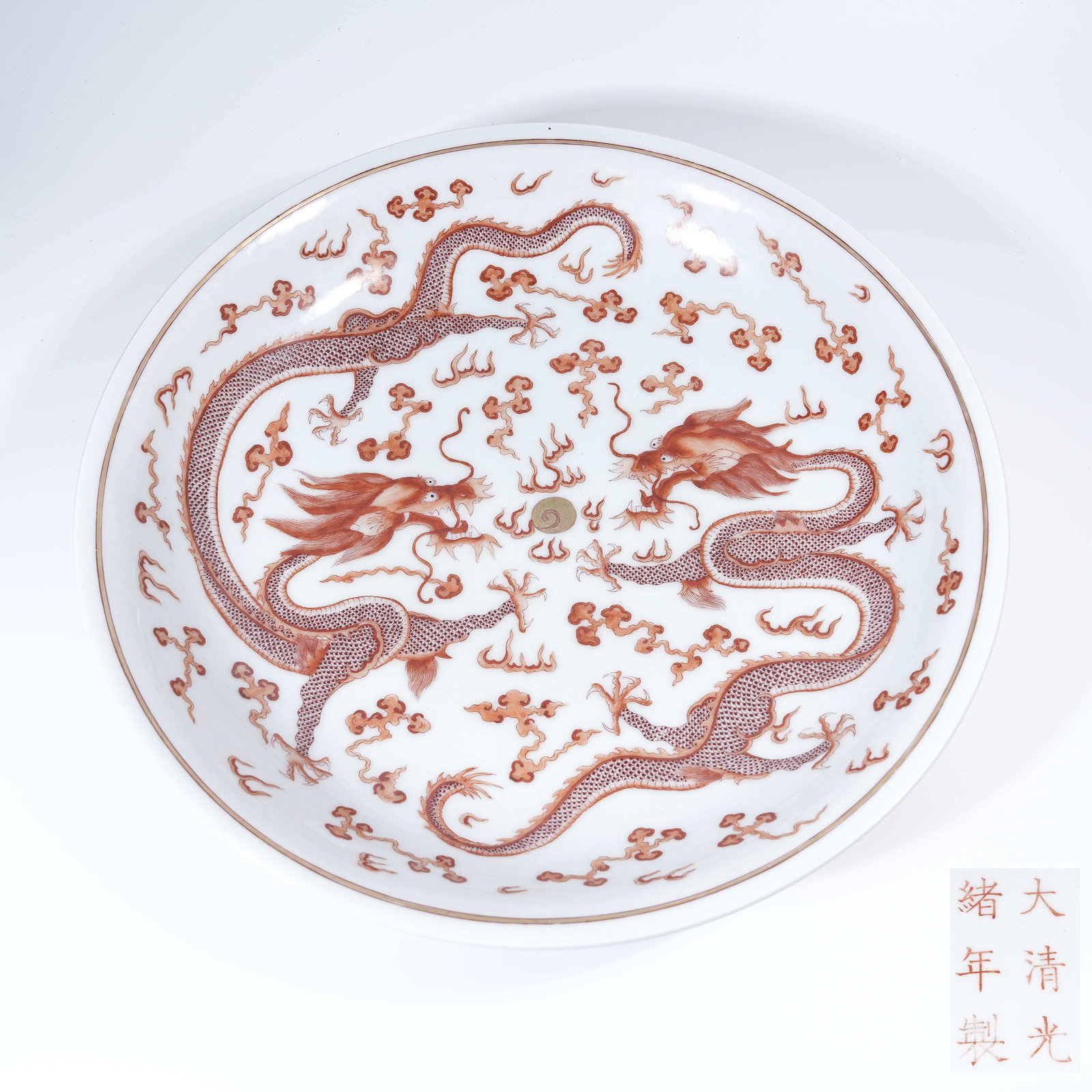 A LARGE PLATE WITH IRON-RED DRAGON CHASING PEARL PATTERN: Large Plate with Iron-Red Dragon Chasing Pearl Pattern