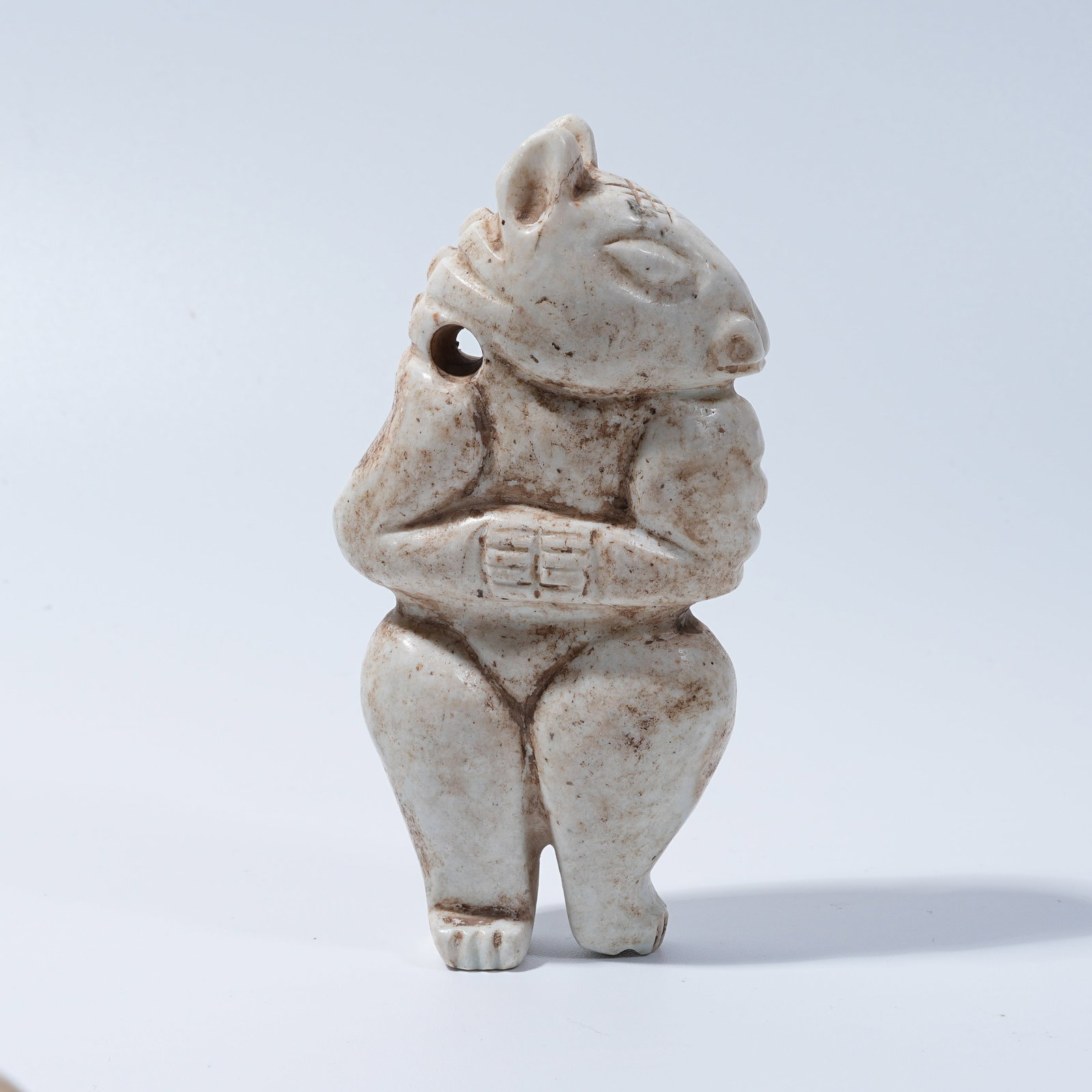 A HONGSHAN CULTURE ARCHAIC JADE ANTHROPOMORPHIC DEITY PENDANT: Hongshan Culture archaic jade anthropomorphic deity pendant
