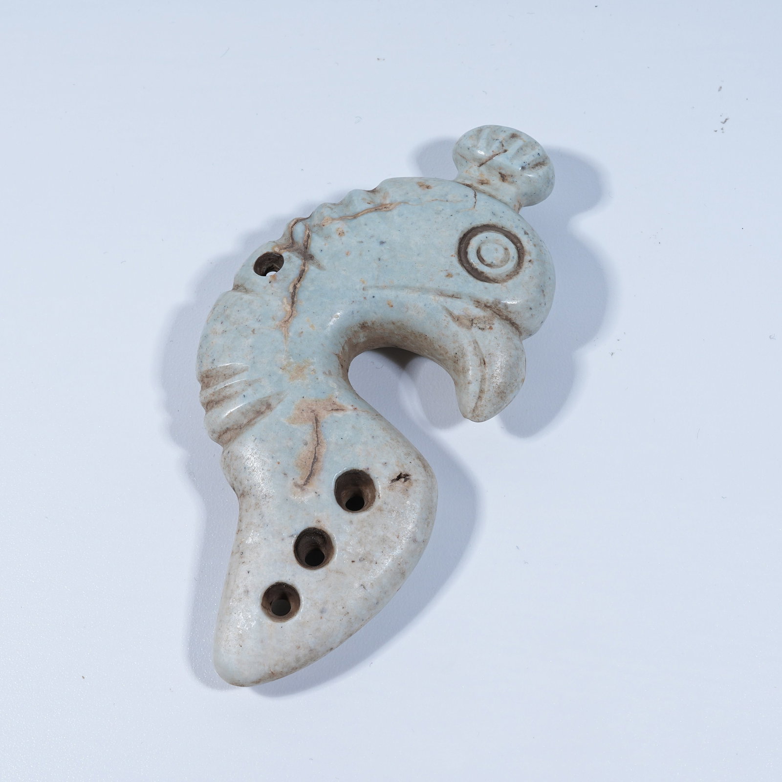 A HONGSHAN CULTURE ARCHAIC JADE PHOENIX-BIRD PENDANT: Hongshan Culture archaic jade phoenix-bird pendant