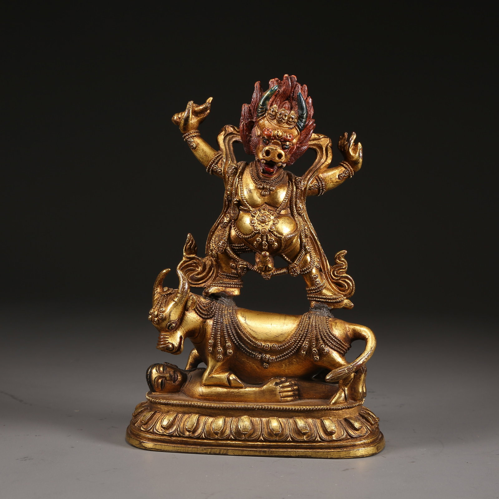 A GILT BRONZE YAMA DEMON STATUE (1 of 8)