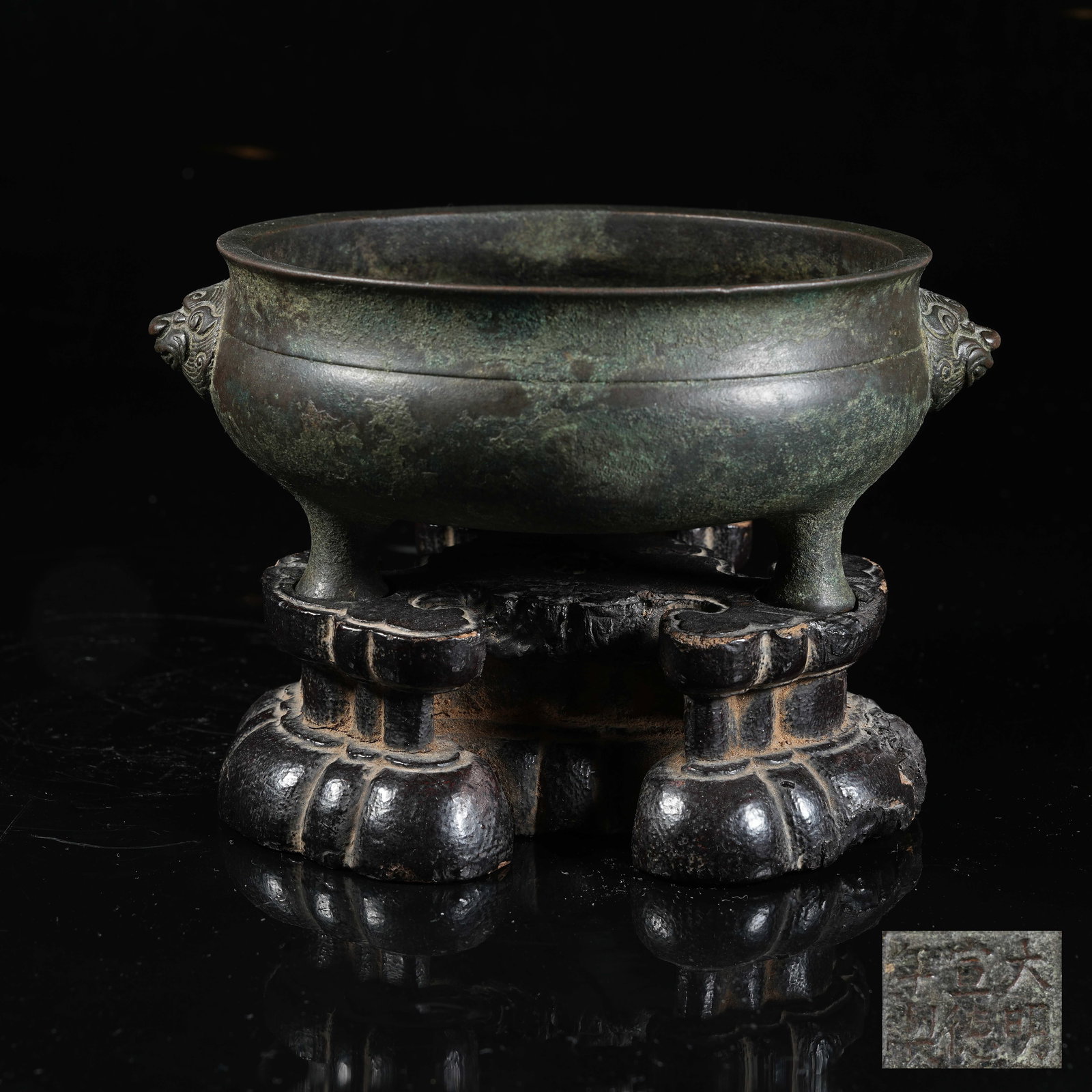 A BRONZE TRIPOD CENSER WITH LION EARS (1 of 10)