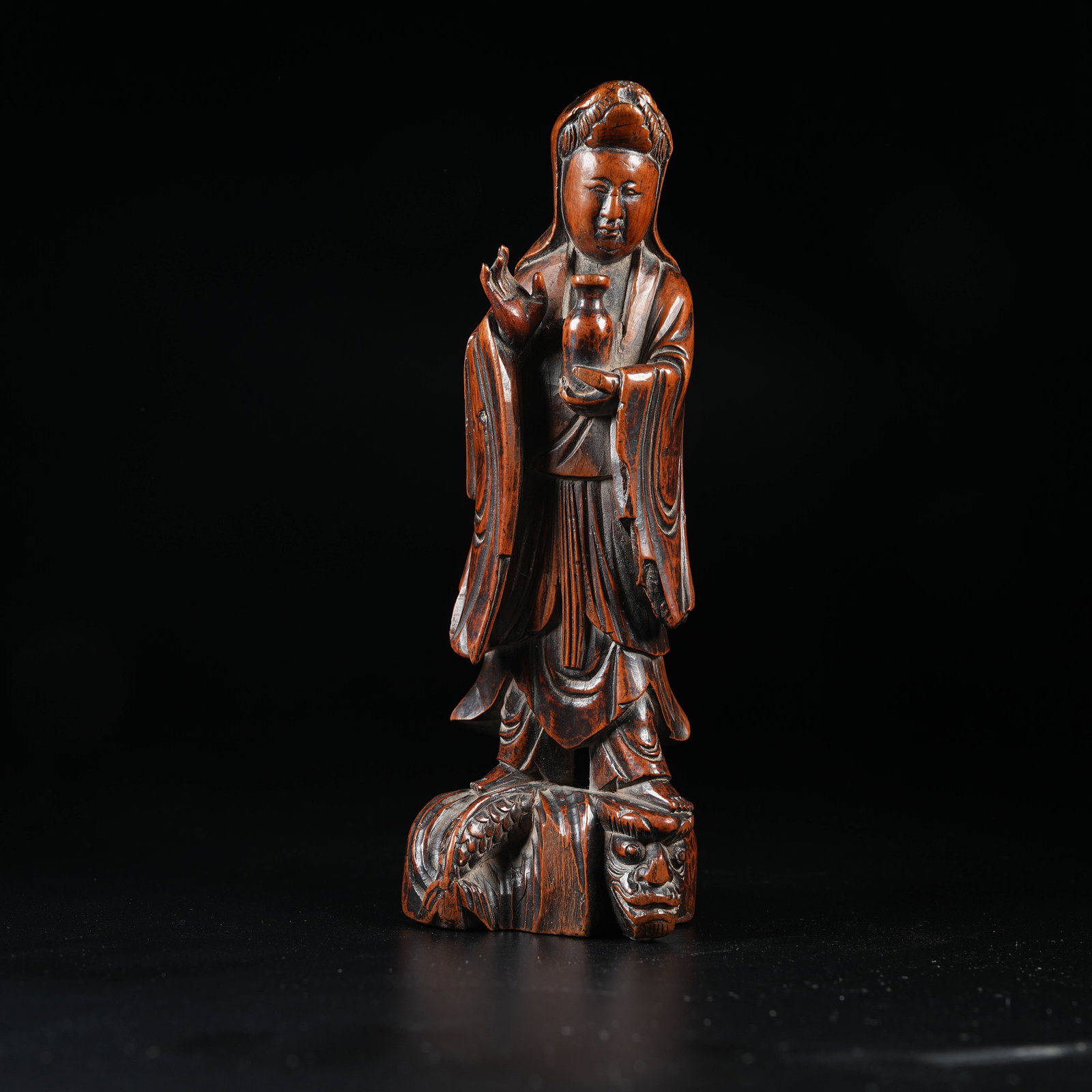 A HUANGHUALI WOOD VASE-SHAPED GUANYIN STATUE: Huanghuali Wood Vase-shaped Guanyin Statue