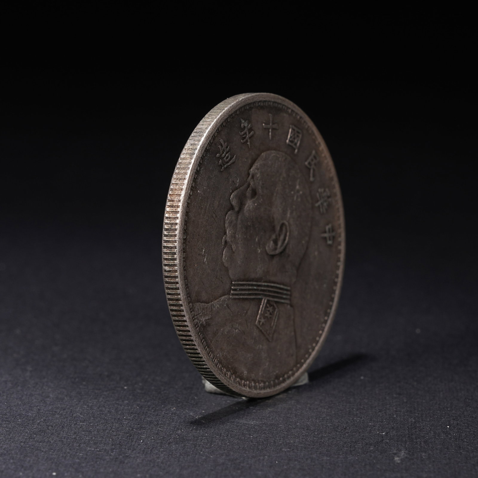A SILVER DOLLAR COIN - 2