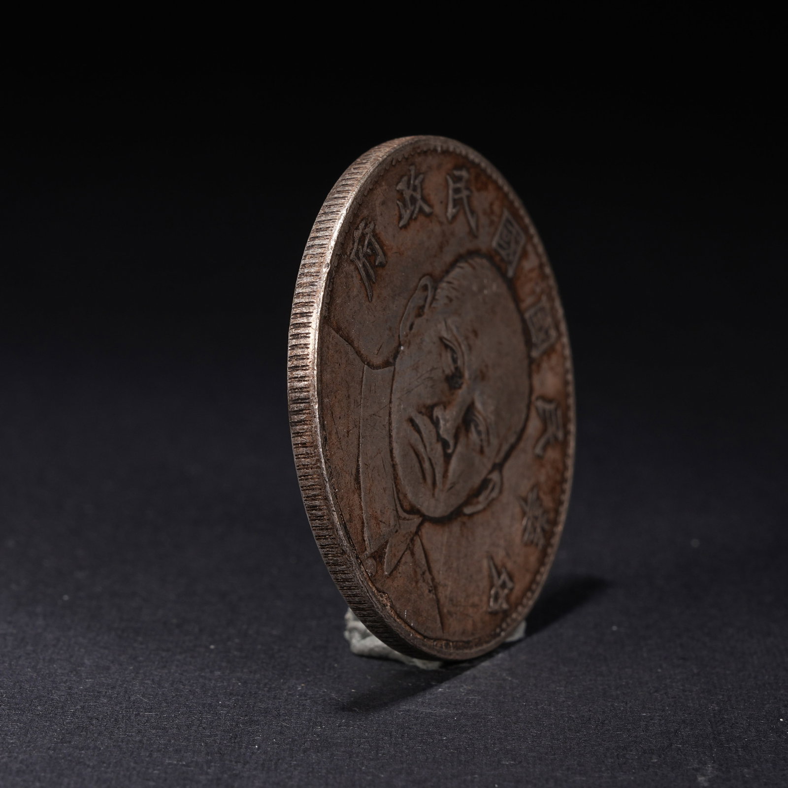 A SILVER DOLLAR COIN - 2