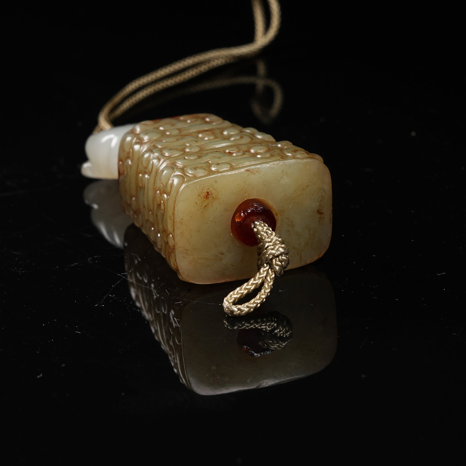 A ARCHAIC JADE CLOUD-SCROLL PATTERN CYLINDRICAL BEAD - 11