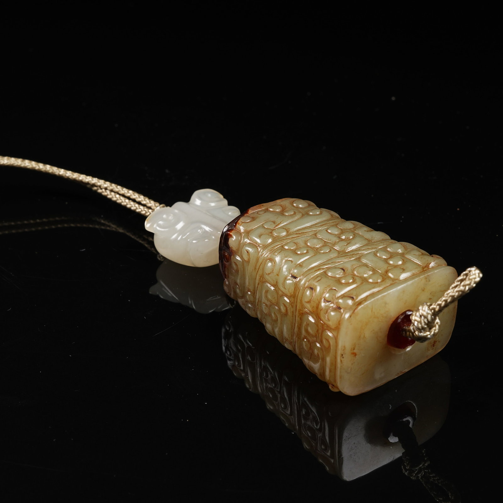 A ARCHAIC JADE CLOUD-SCROLL PATTERN CYLINDRICAL BEAD - 5