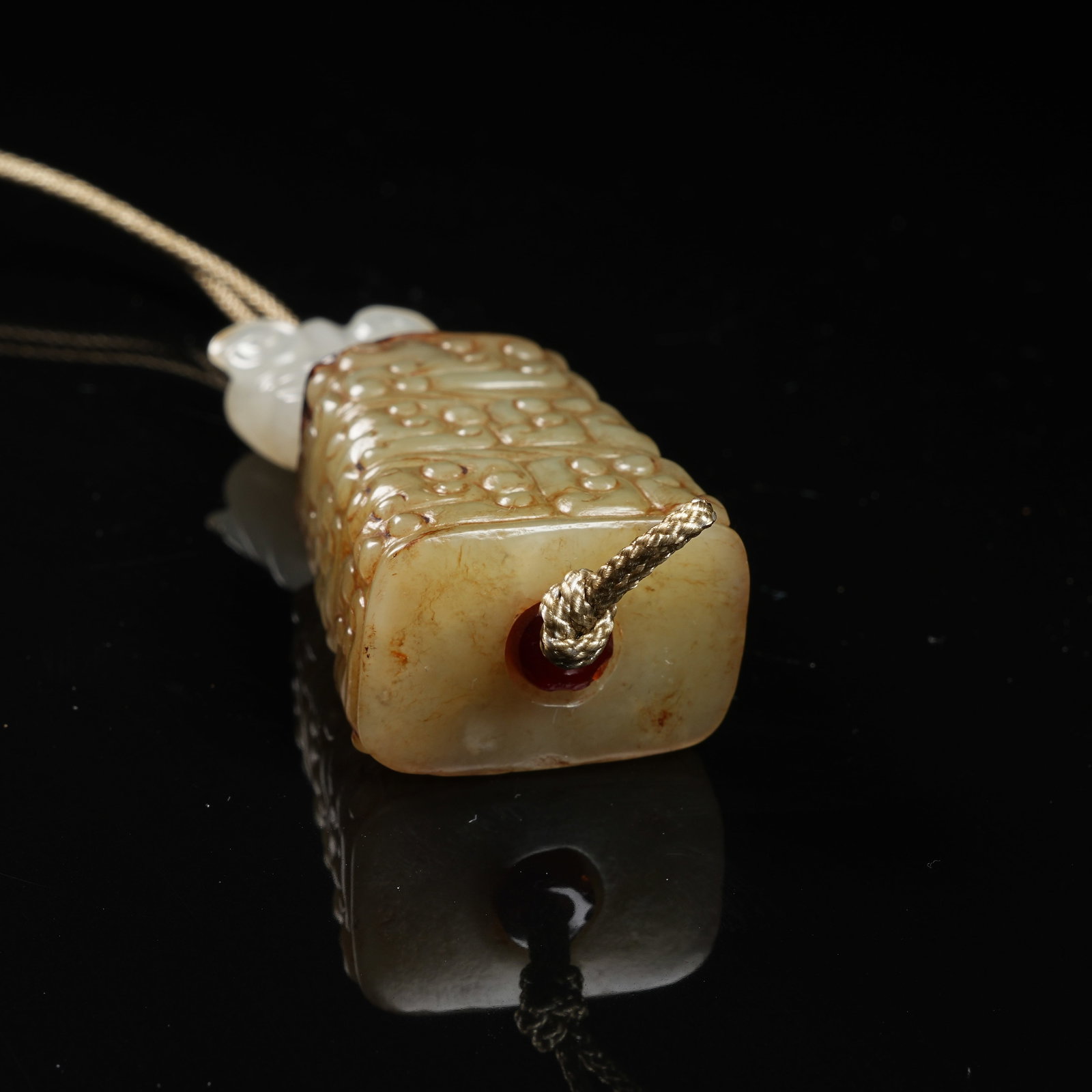 A ARCHAIC JADE CLOUD-SCROLL PATTERN CYLINDRICAL BEAD - 6