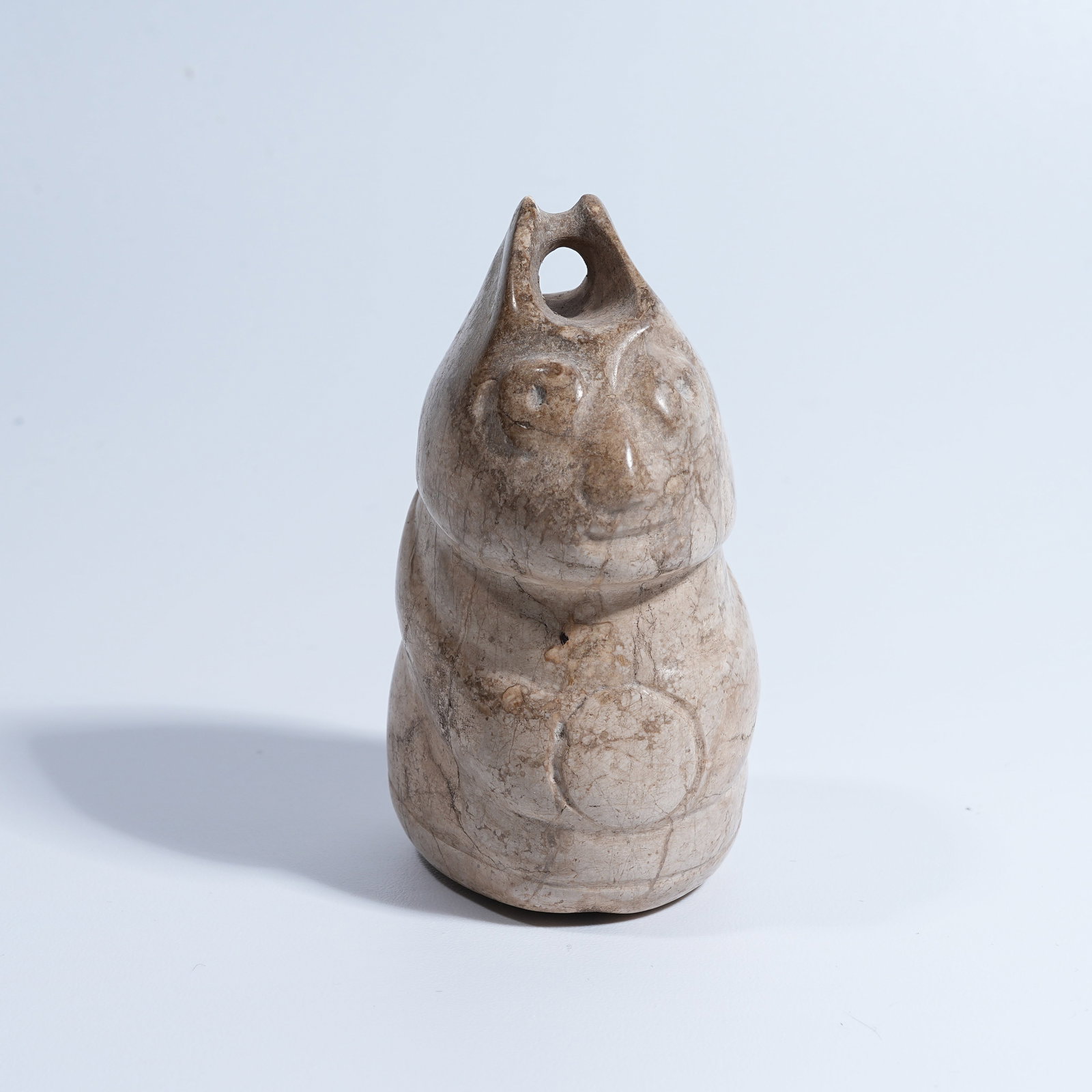 A HONGSHAN CULTURE ARCHAIC JADE ANTHROPOMORPHIC DEITY PENDANT: Hongshan Culture archaic jade anthropomorphic deity pendant