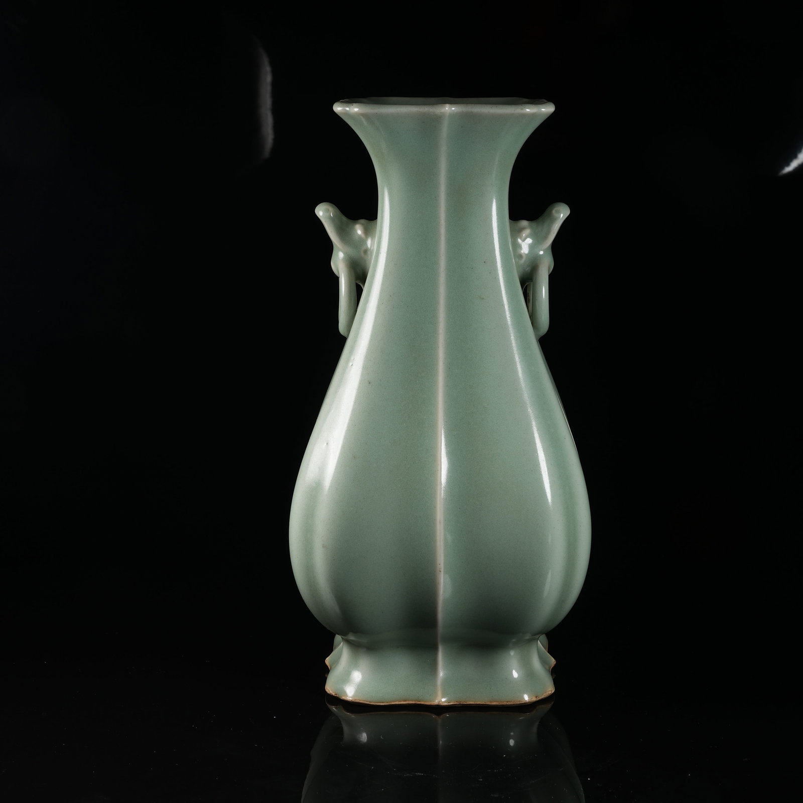 A LONGQUAN WARE MASK-HANDLED FOLIATE-RIM ZUN VASE: Longquan ware mask-handled foliate-rim zun vase