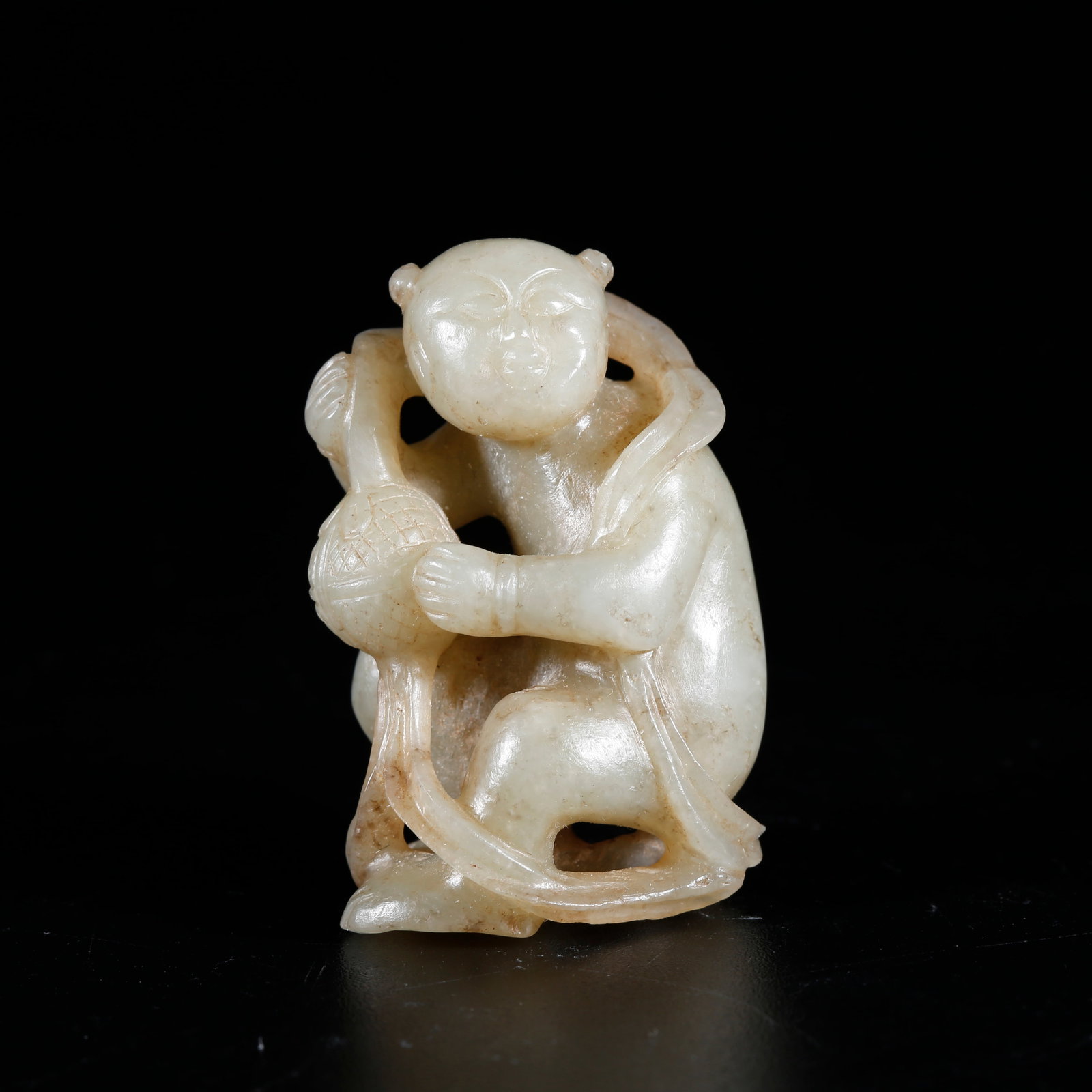 A HETIAN JADE BOY-SHAPED ORNAMENT: Hetian Jade Boy-shaped Ornament
