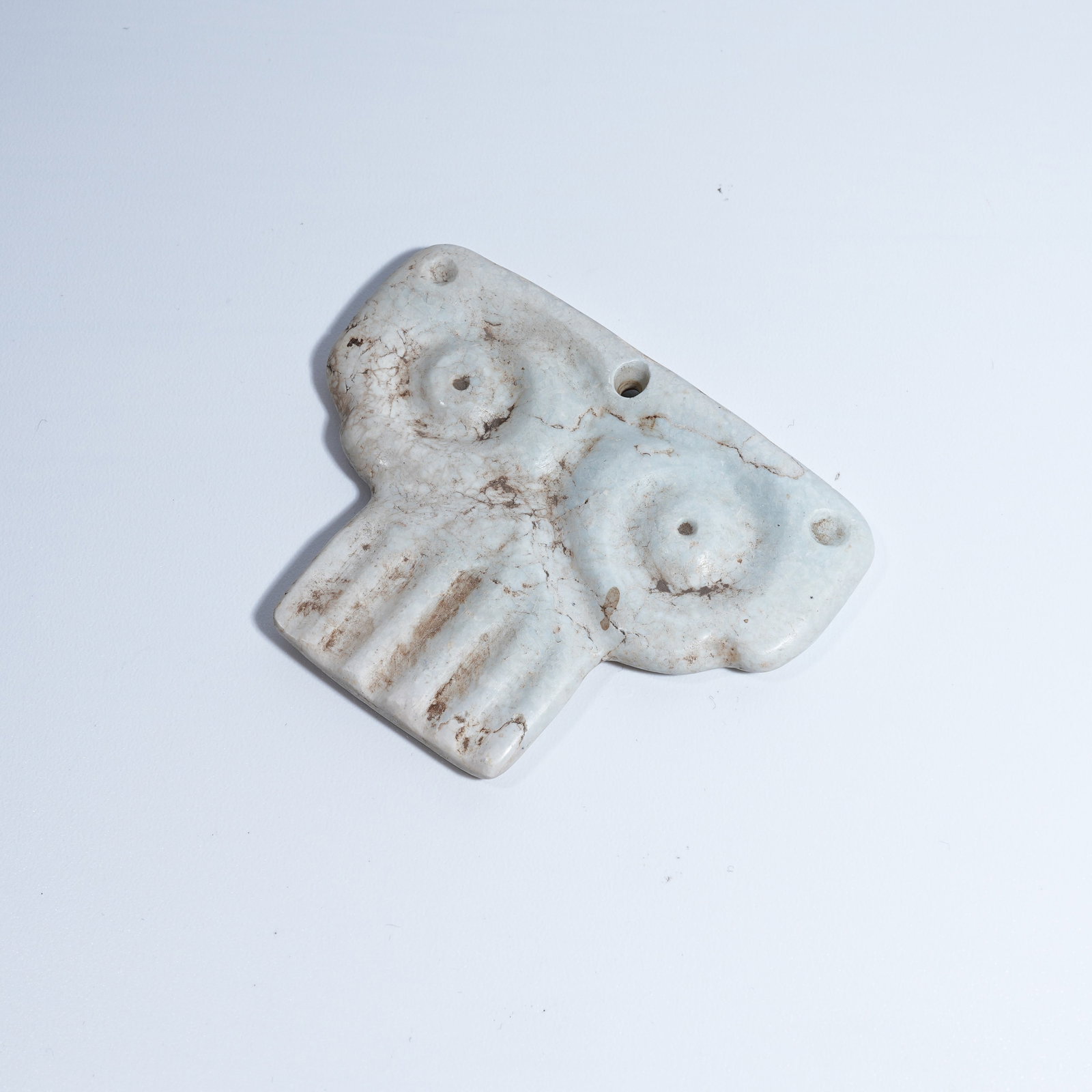 A HONGSHAN CULTURE ARCHAIC JADE ANTHROPOMORPHIC DEITY PENDANT: Hongshan Culture archaic jade anthropomorphic deity pendant