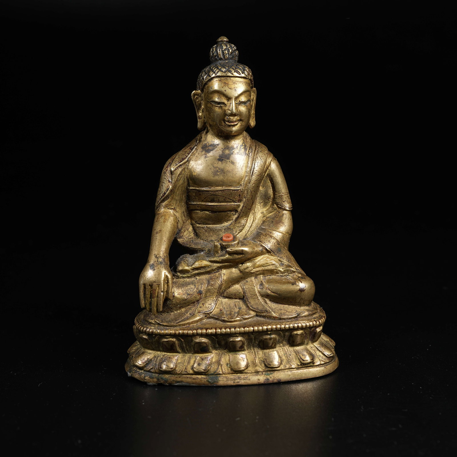 A GILT BRONZE STATUE OF MEDICINE BUDDHA (1 of 9)