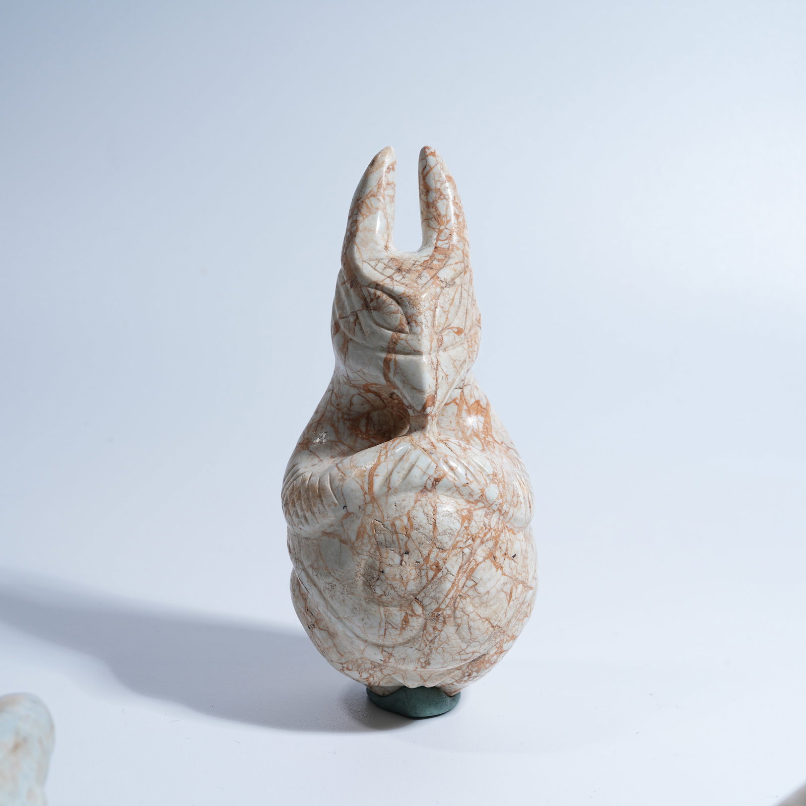 A HONGSHAN CULTURE ARCHAIC JADE ANTHROPOMORPHIC DEITY PENDANT: Hongshan Culture archaic jade anthropomorphic deity pendant