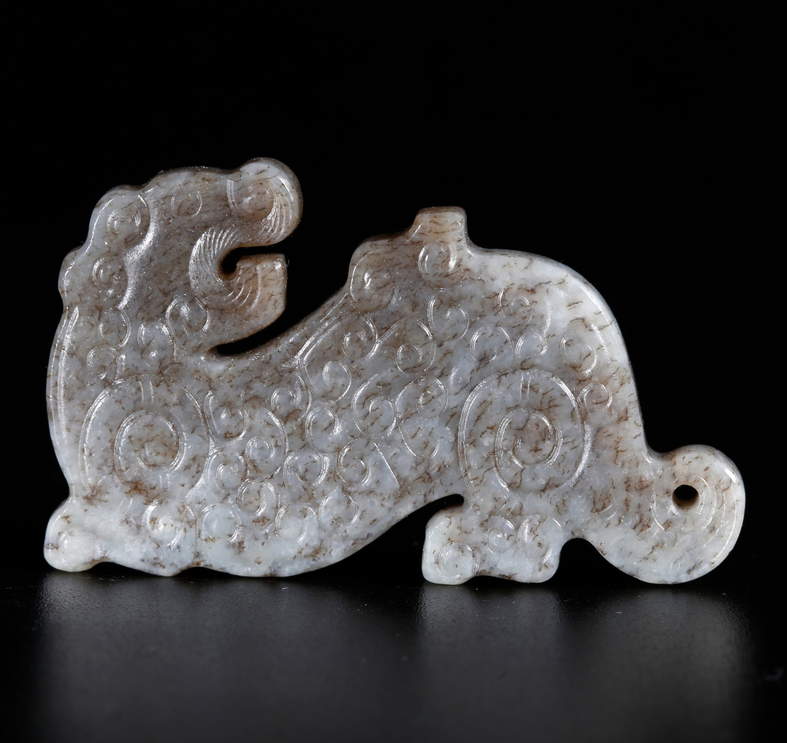 A ANCIENT JADE BEAST-SHAPED PENDANT: Ancient Jade Beast-shaped Pendant