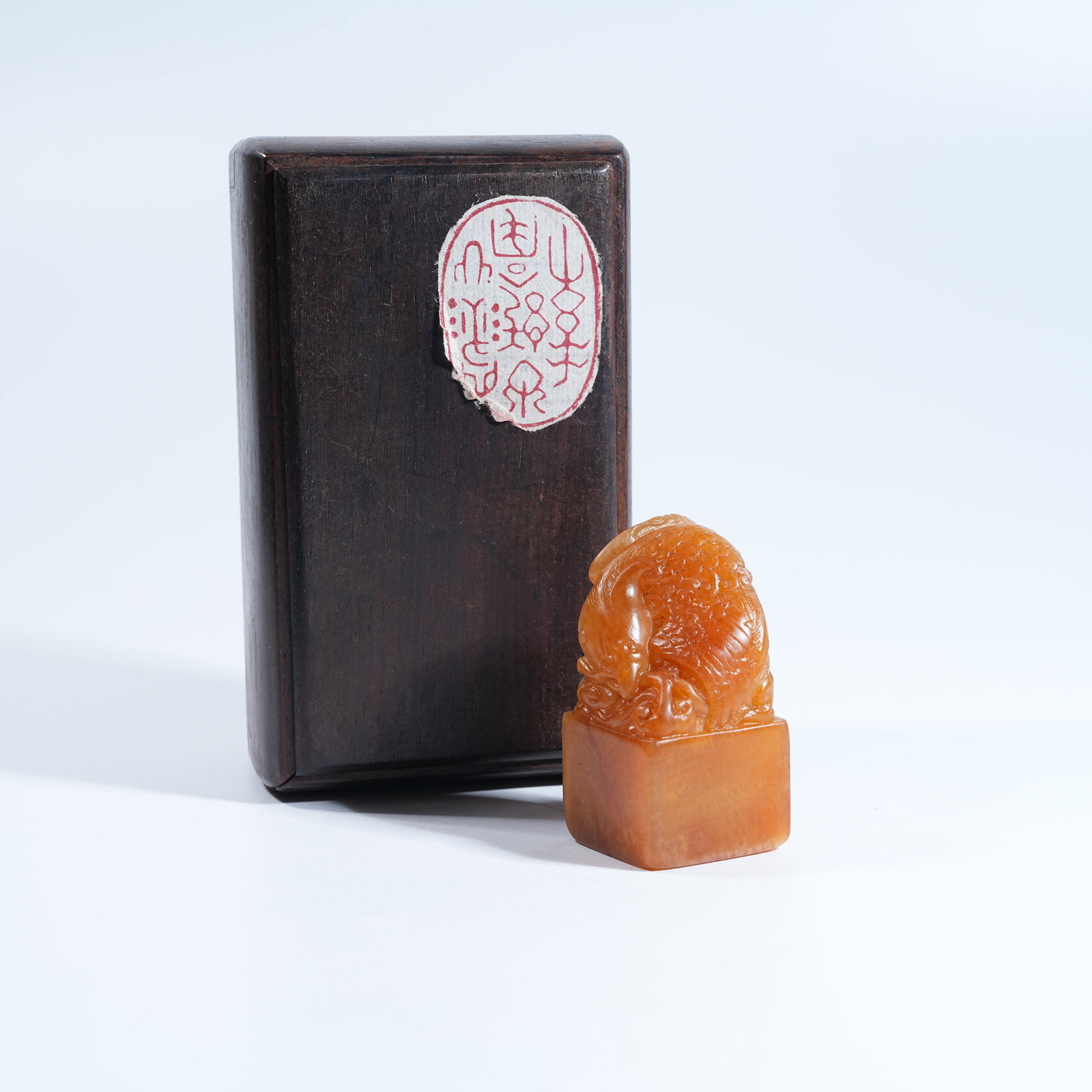 A SHOUSHAN TIANHUANG STONE SEAL WITH PHOENIX KNOB: Shoushan Tianhuang Stone Seal with Phoenix Knob