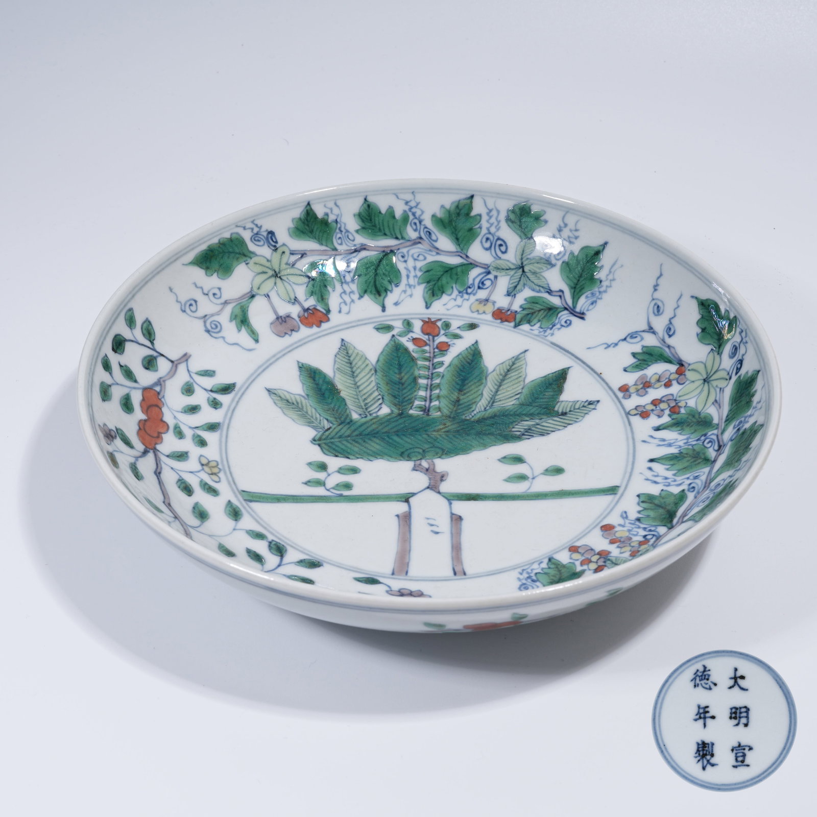 A DOUCAI PLATE WITH FLOWER AND FRUIT PATTERN (1 of 9)