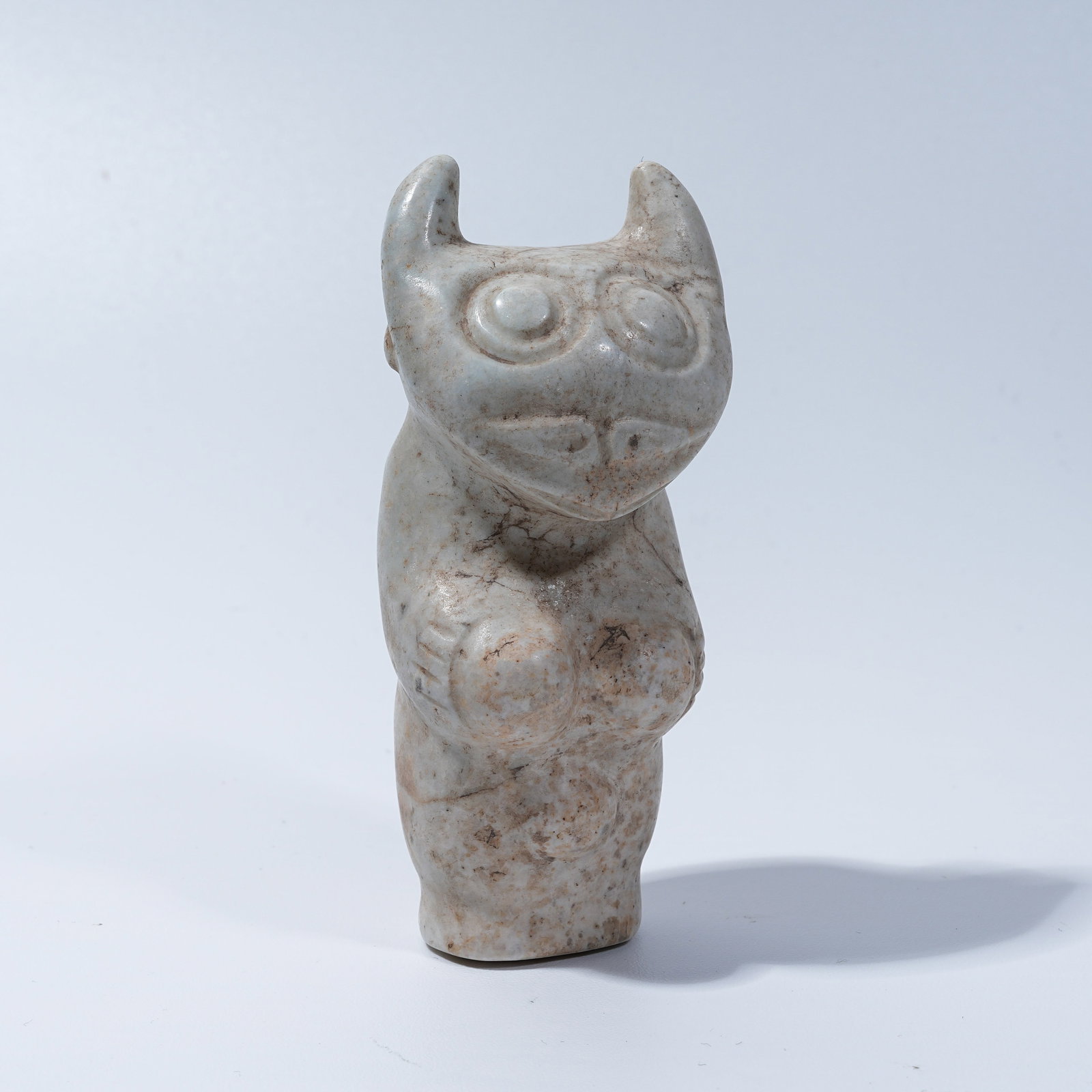 A HONGSHAN CULTURE ARCHAIC JADE ANTHROPOMORPHIC DEITY PENDANT: Hongshan Culture archaic jade anthropomorphic deity pendant