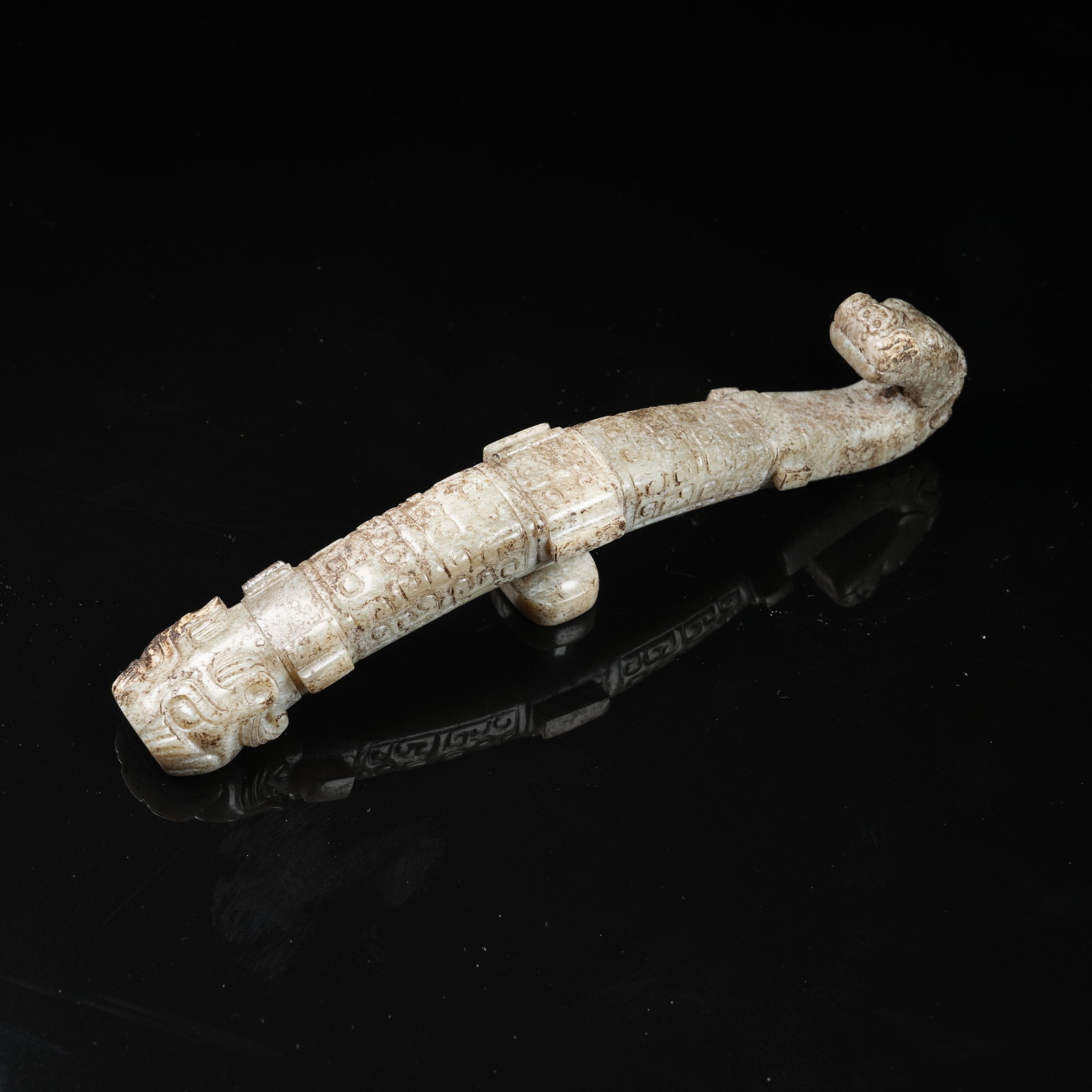 A ARCHAIC JADE DRAGON-HEAD BELT HOOK (1 of 8)