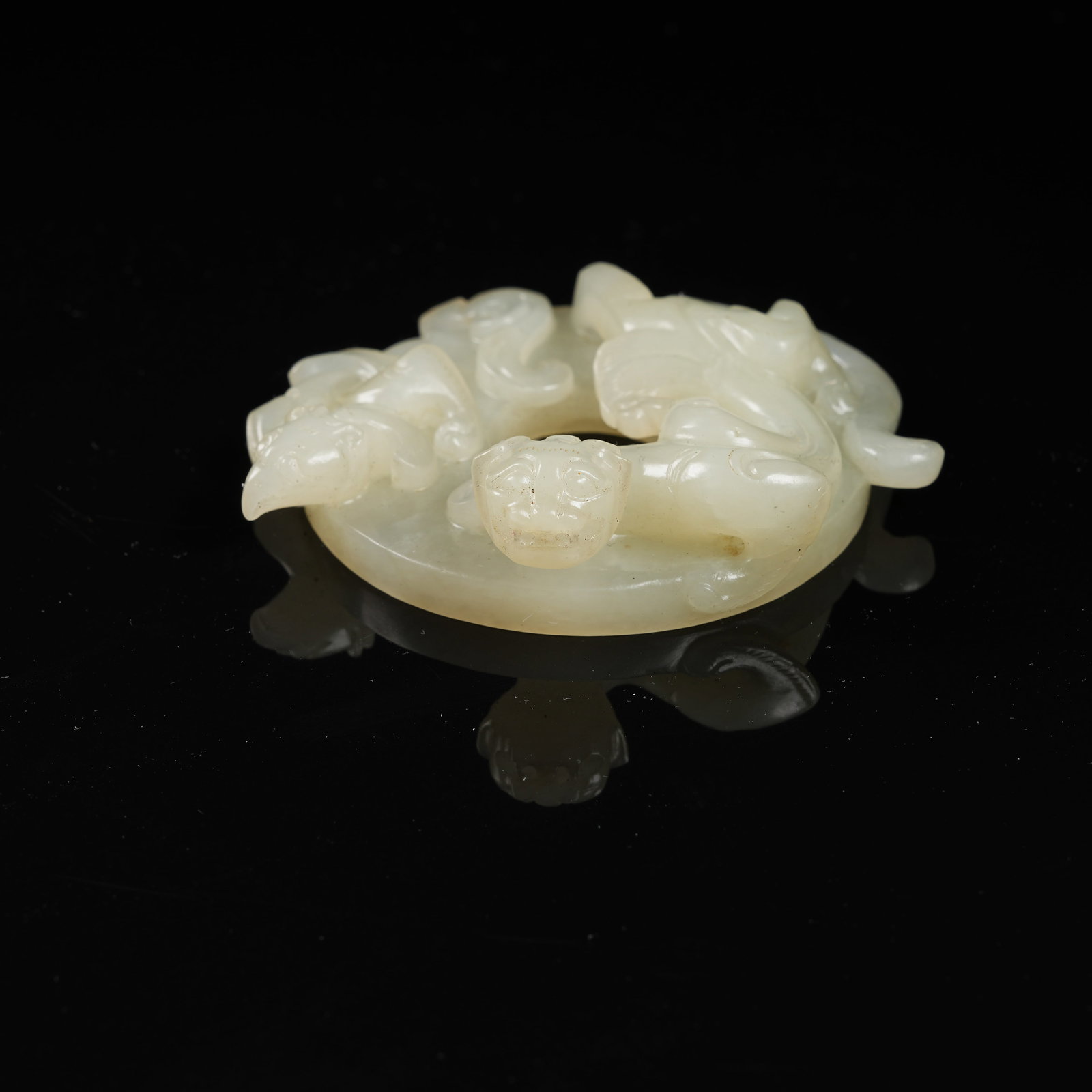 A HETIAN JADE CHI-DRAGON PATTERN OPENWORK BI DISC: Hetian jade chi-dragon pattern openwork bi disc