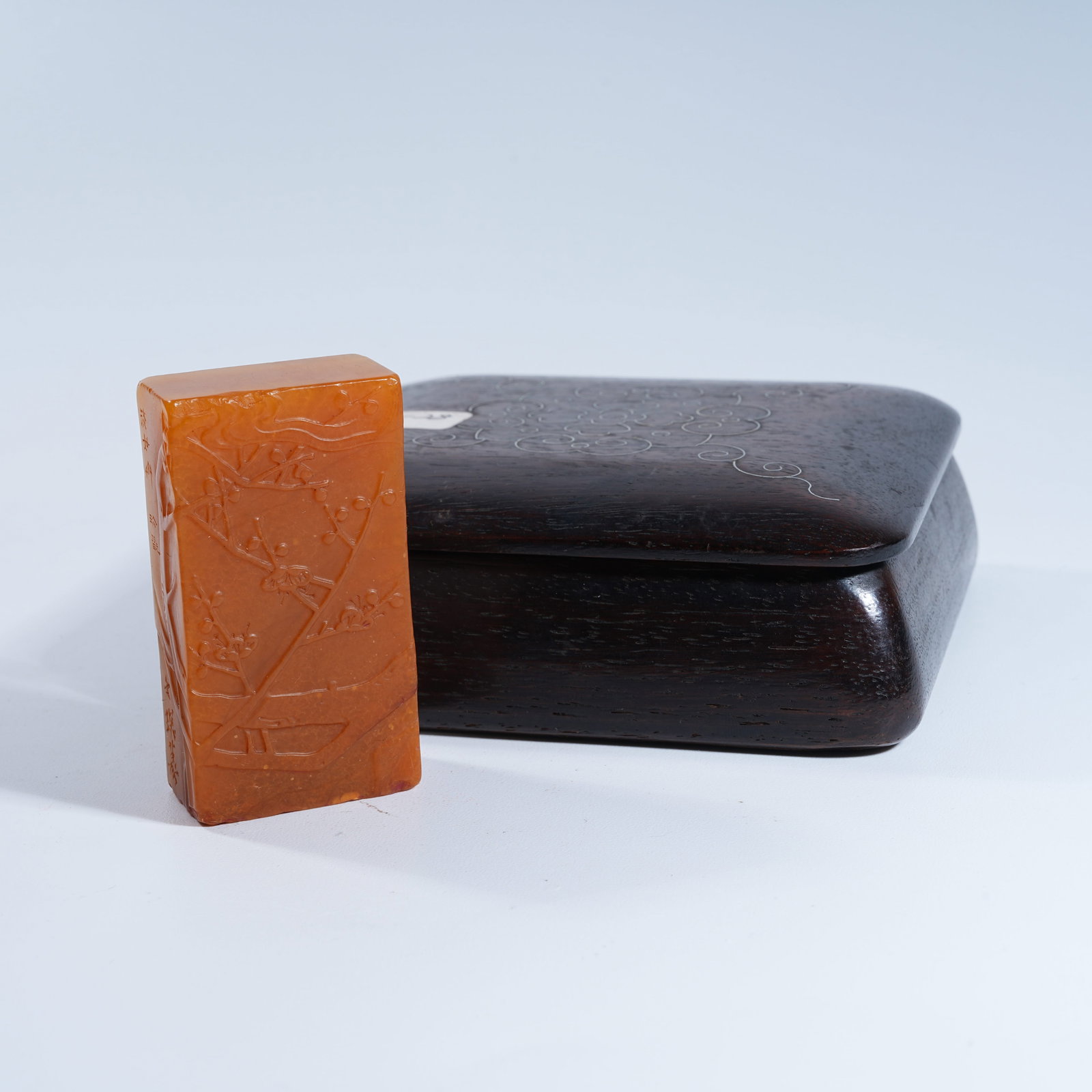 A SHOUSHAN TIANHUANG STONE SEAL WITH PLUM BLOSSOM PATTERN: Shoushan Tianhuang Stone Seal with Plum Blossom Pattern