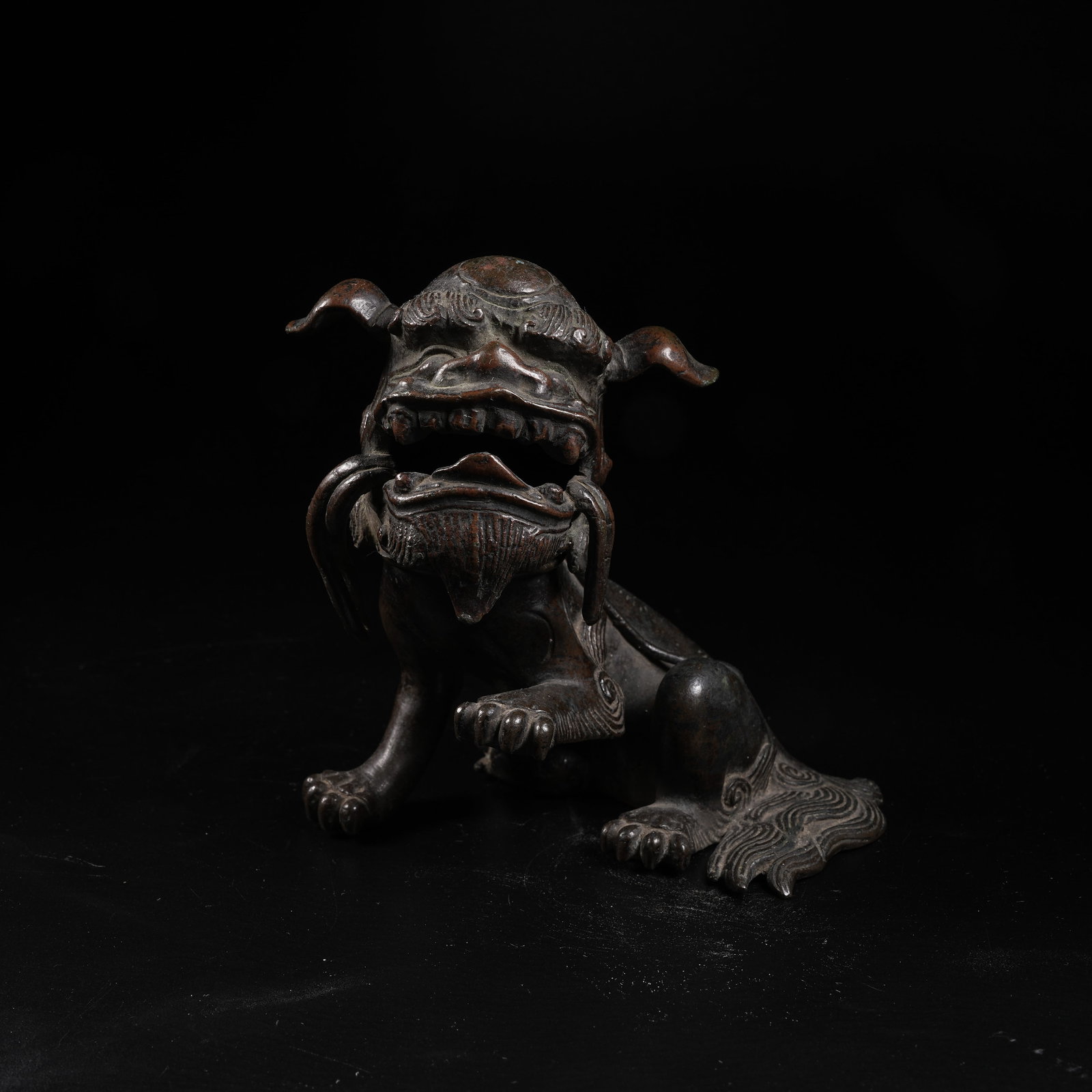 A COPPER SEATED LION INCENSE DIFFUSER (1 of 9)
