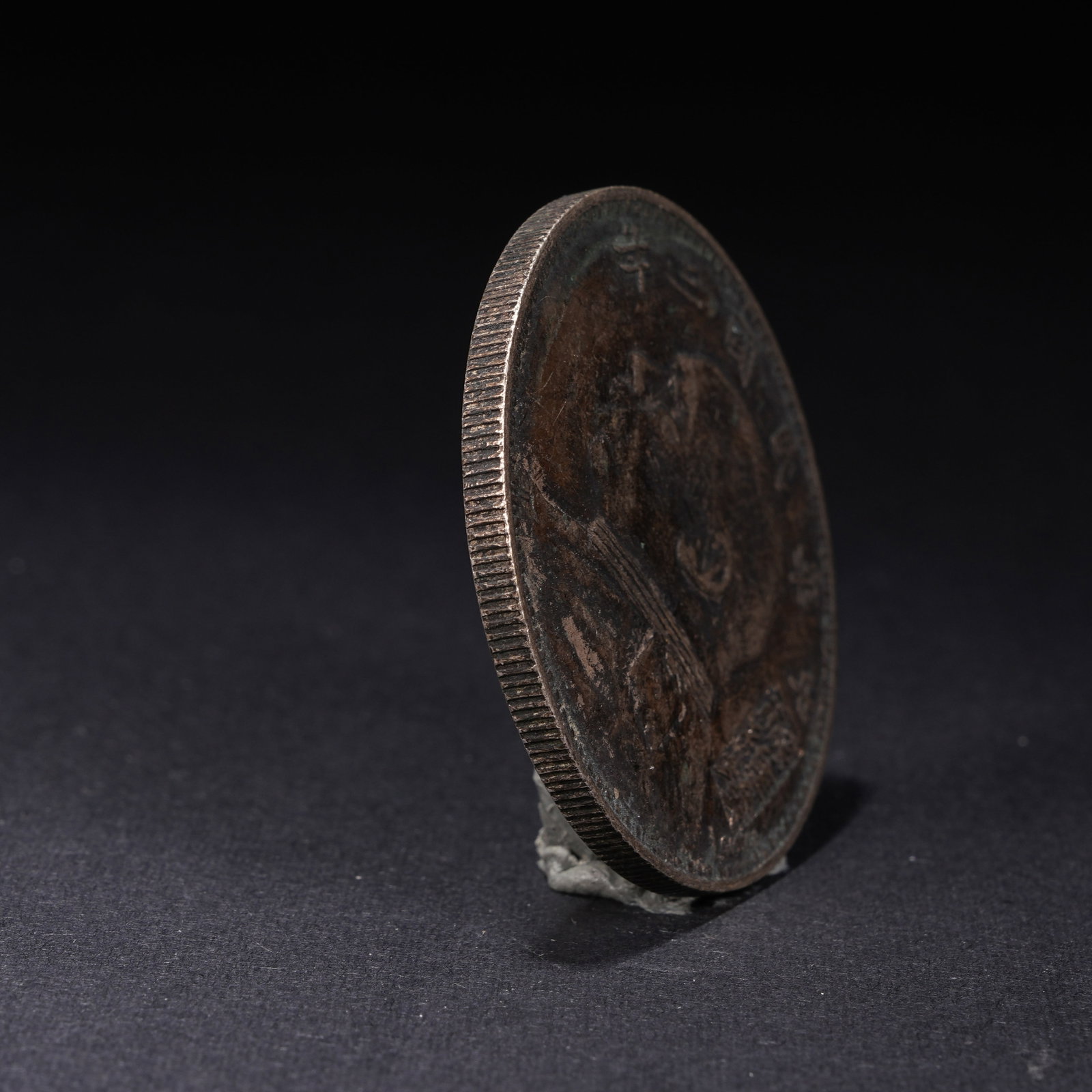 A SILVER DOLLAR COIN - 2