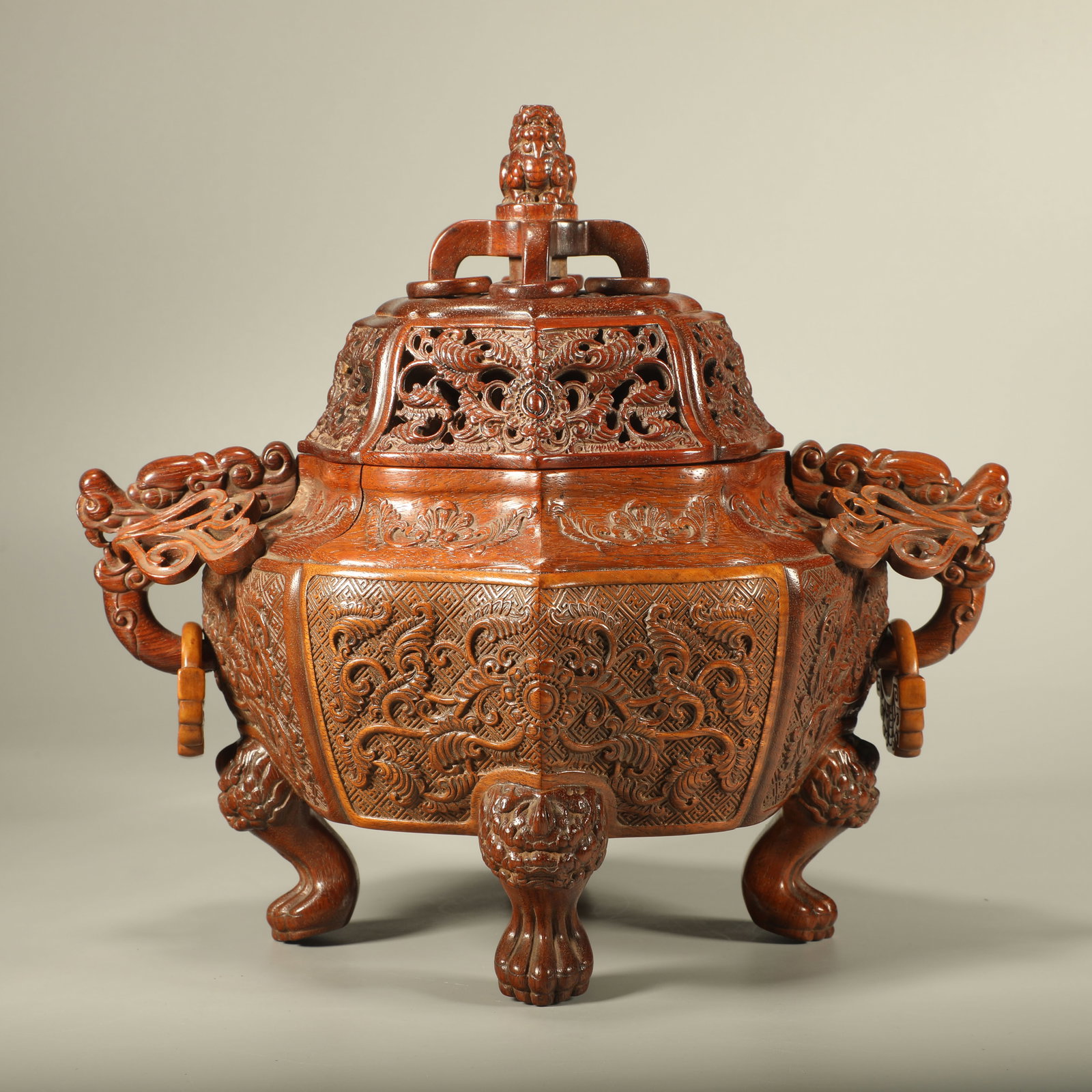 A HUANGHUALI INCENSE BURNER WITH FLORAL CARVINGS AND DRAGON EARS (1 of 6)