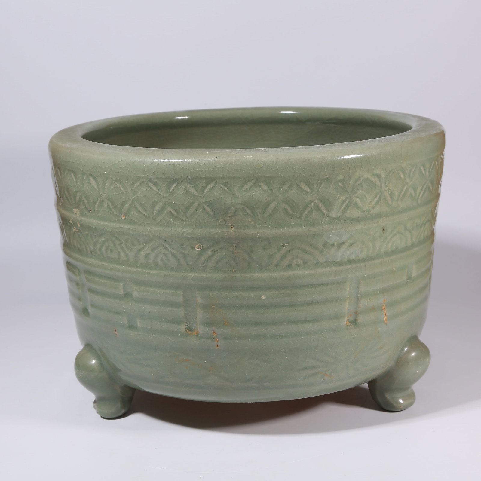 A LONGQUAN KILN TRIPOD CYLINDRICAL CENSER WITH BAGUA MOTIFS (1 of 8)