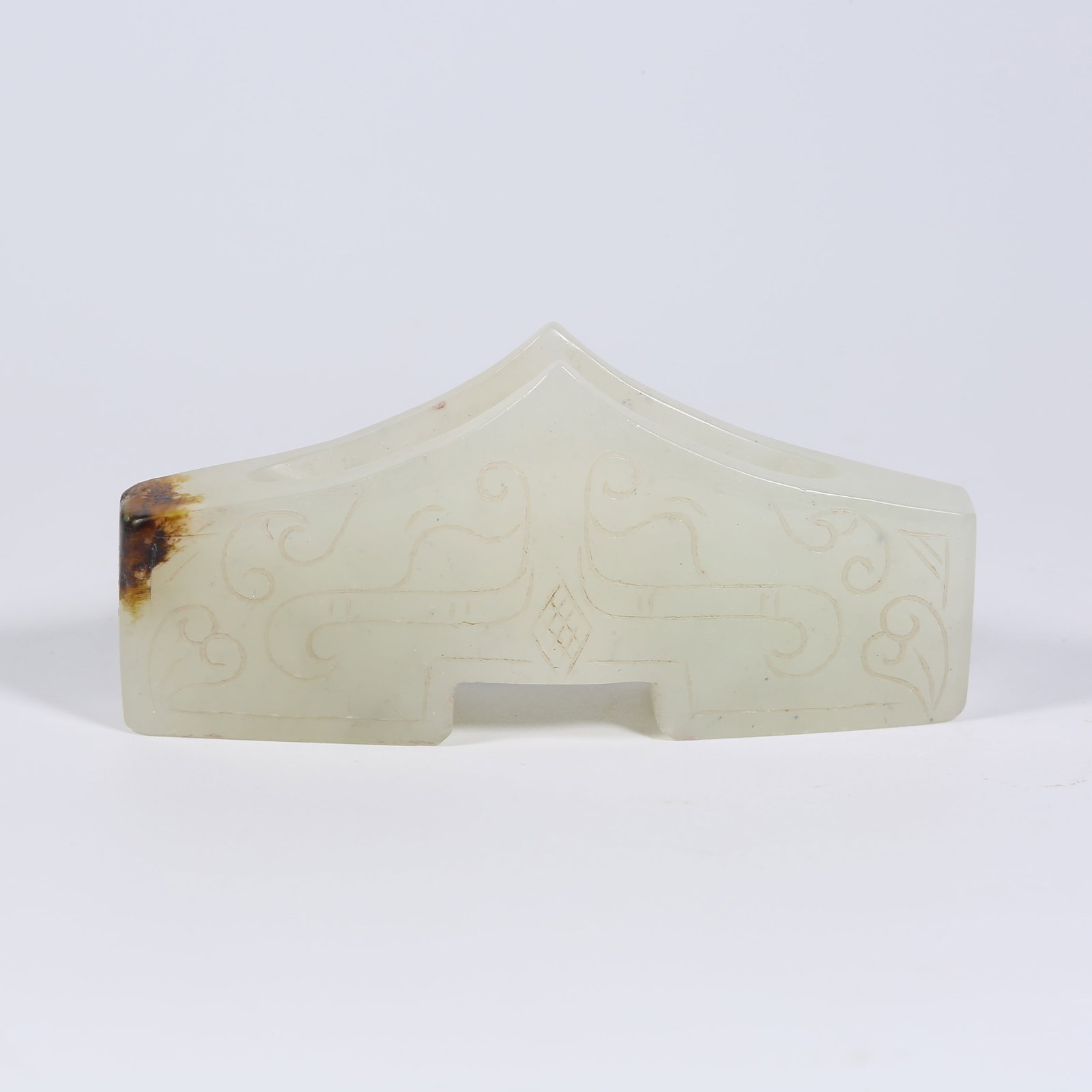 A ANCIENT JADE SWORD GUARD WITH BEAST FACE MOTIF: Ancient Jade Sword Guard with Beast Face Motif