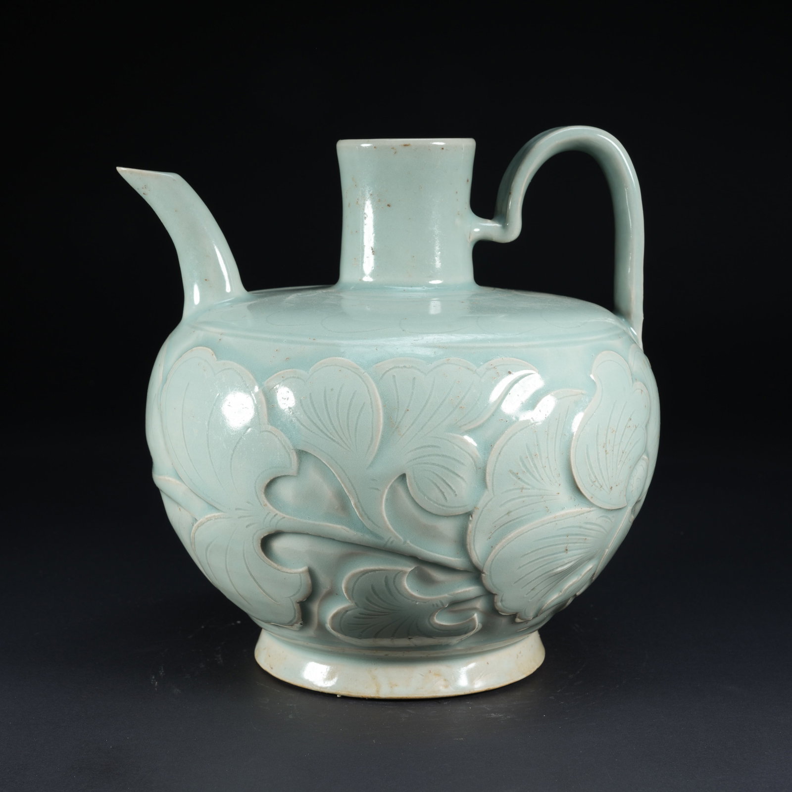 A YINGQING GLAZED CARVED EWER (1 of 10)
