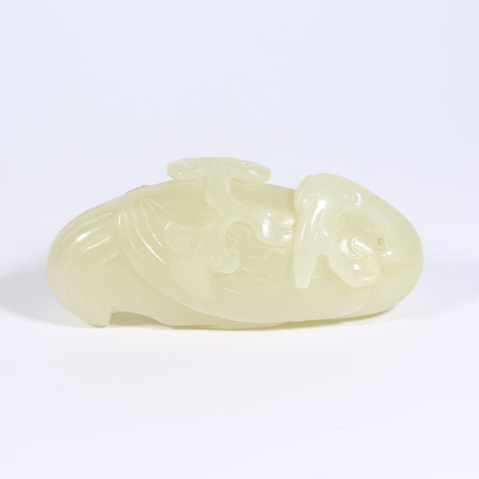 A HETIAN JADE PENDANT OF IMMORTAL CRANE HOLDING A BRANCH (1 of 8)