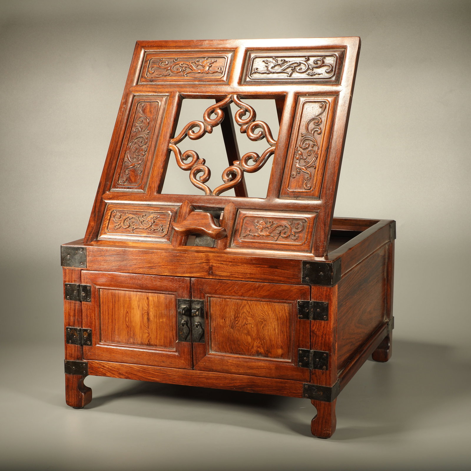 A HUANGHUALI DRESSING MIRROR STAND CARVED WITH DRAGON PATTERN (1 of 6)