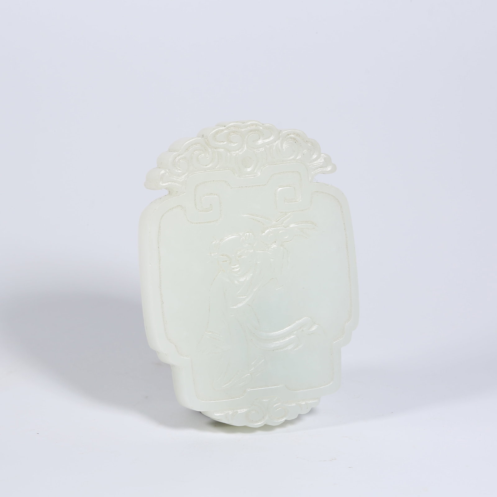 A HETIAN WHITE JADE PLAQUE OF CHILD HOLDING LINGZHI (1 of 7)