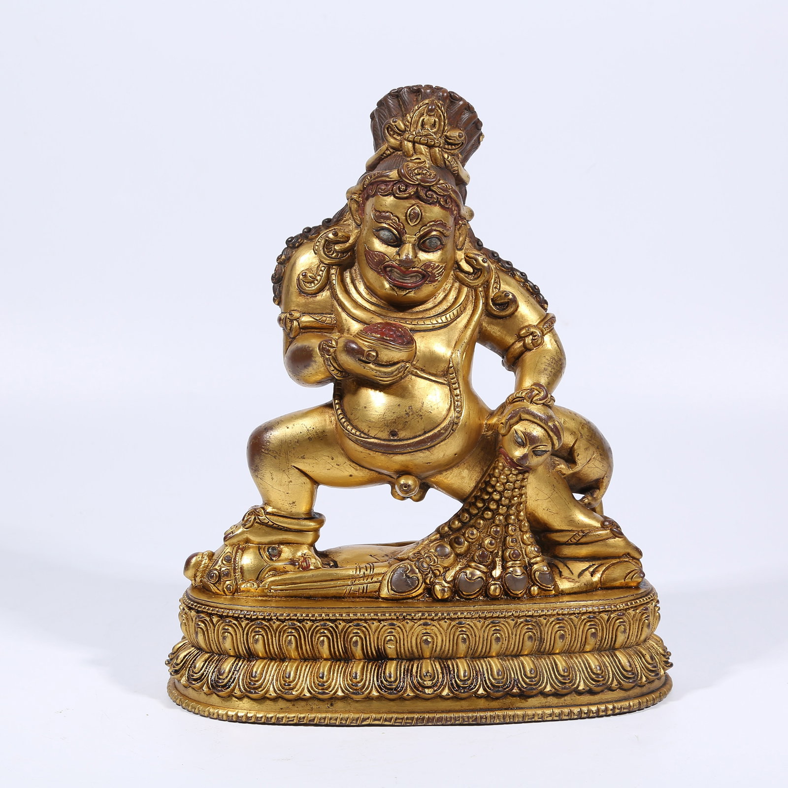 A GILT BRONZE BLACK JAMBHALA STATUE: Gilt Bronze Black Jambhala Statue