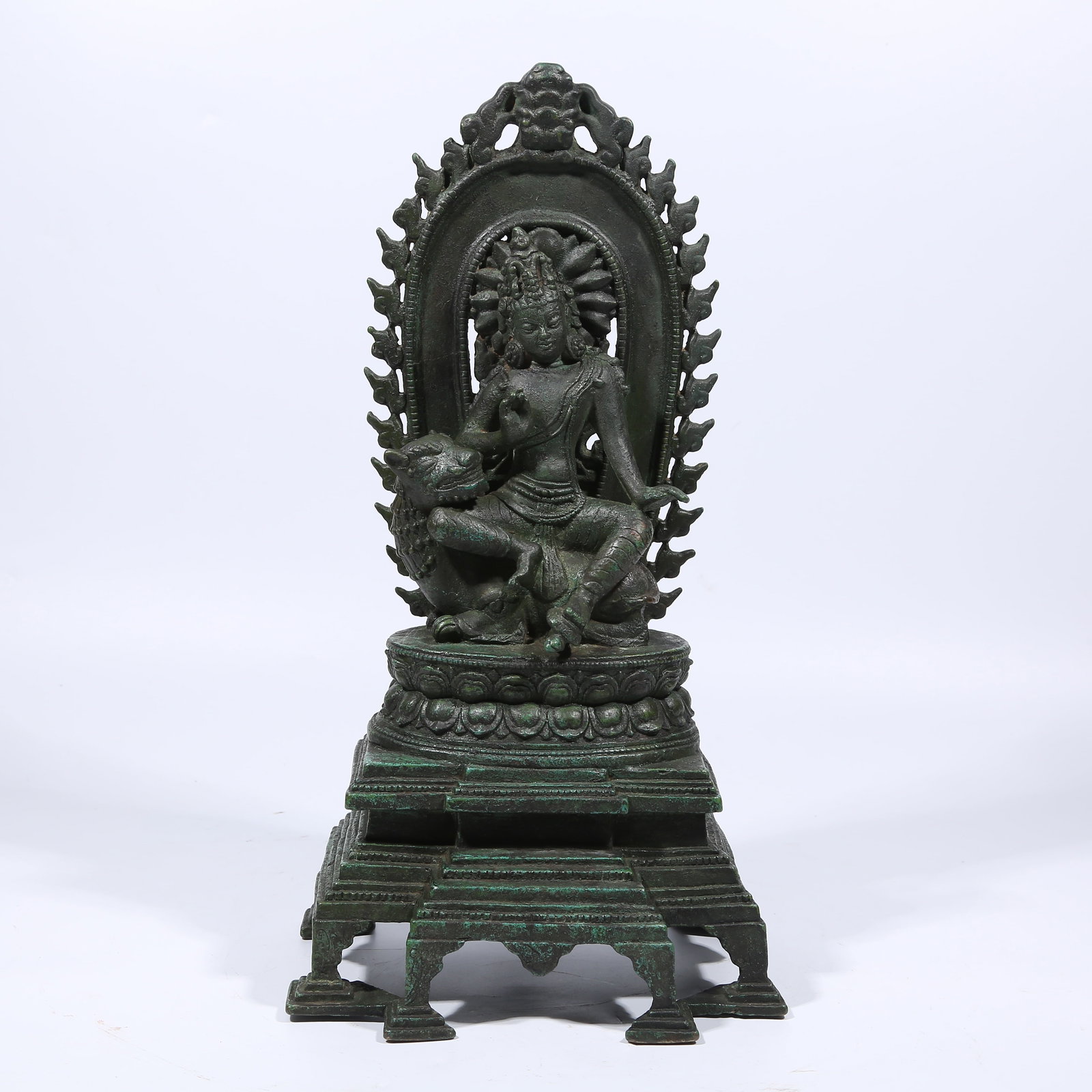 A BRONZE LION’S ROAR AVALOKITESHVARA STATUE: Bronze Lion’s Roar Avalokiteshvara Statue
