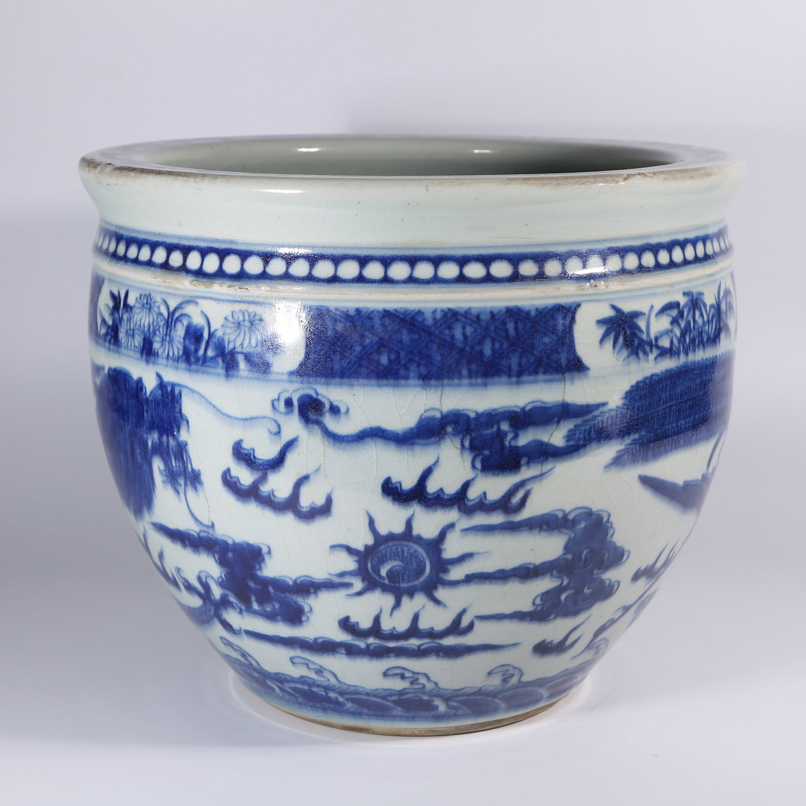 A BLUE-AND-WHITE JAR WITH DRAGON AND PHOENIX PATTERN: Blue-and-White Jar with Dragon and Phoenix Pattern