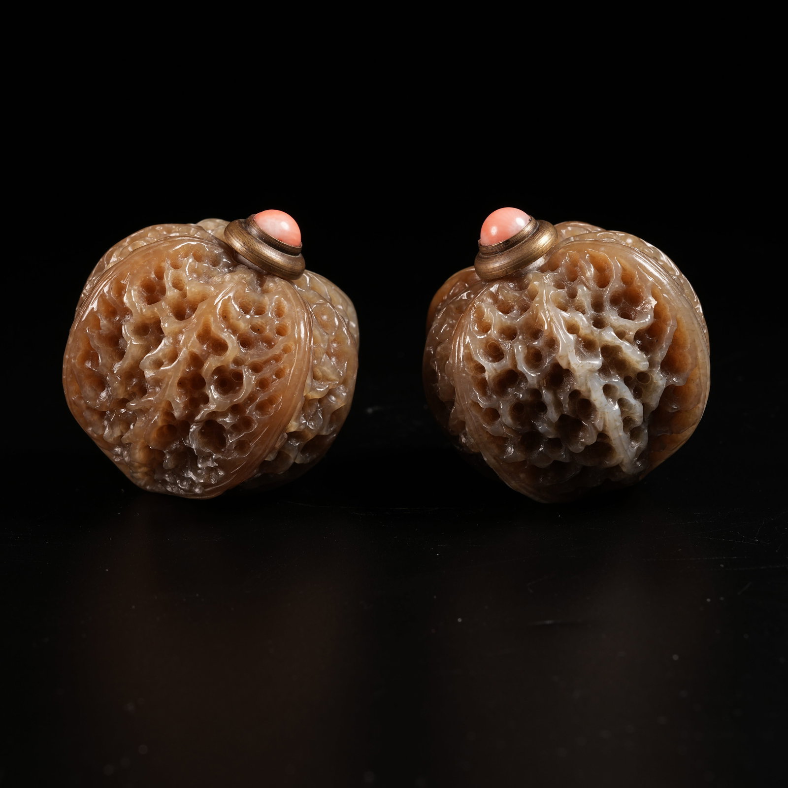 A SET OF HETIAN JADE CARVED WALNUT SNUFF BOTTLES: Set of Hetian Jade Carved Walnut Snuff Bottles