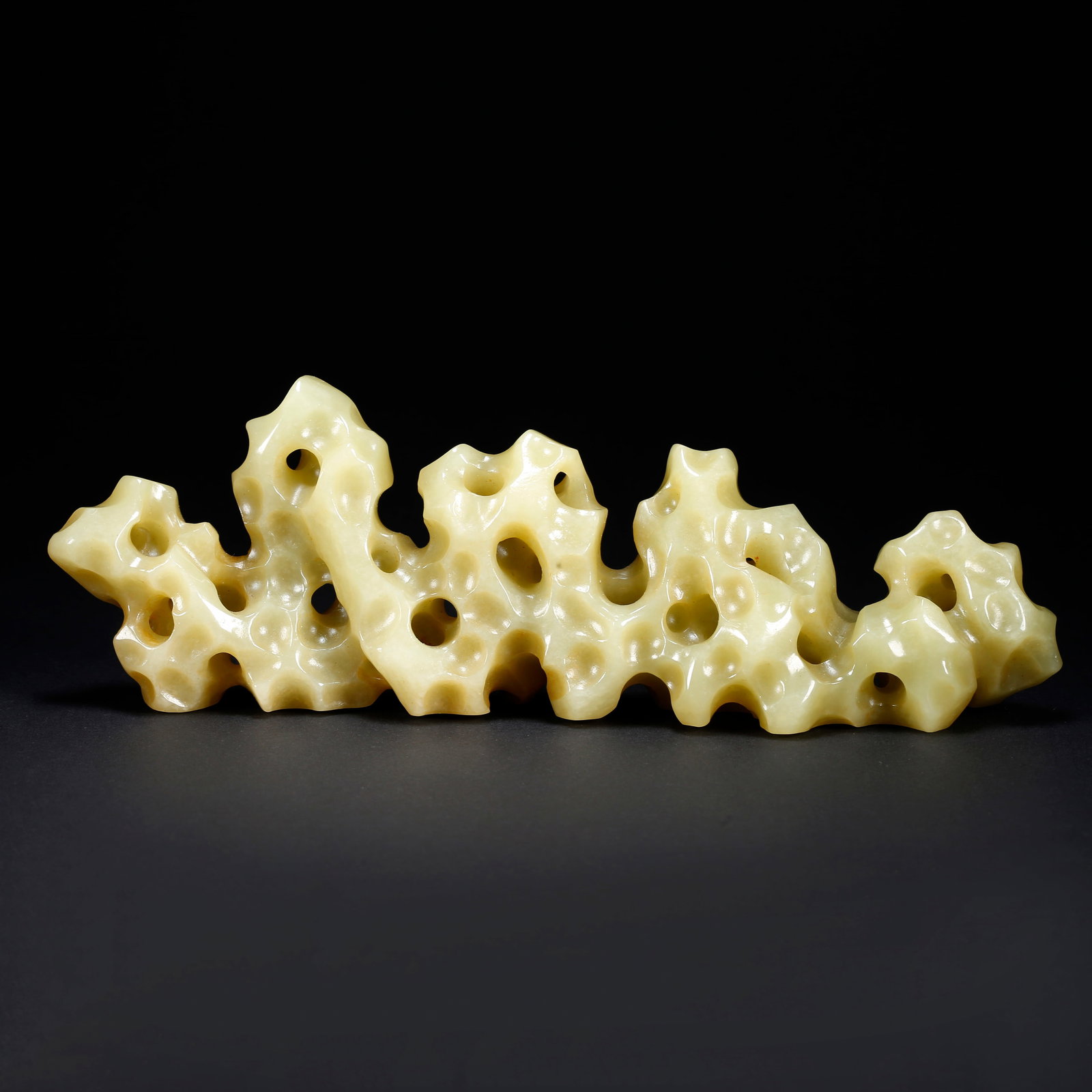 A HETIAN YELLOW JADE MINIATURE MOUNTAIN FIGURINE: Hetian Yellow Jade Miniature Mountain Figurine